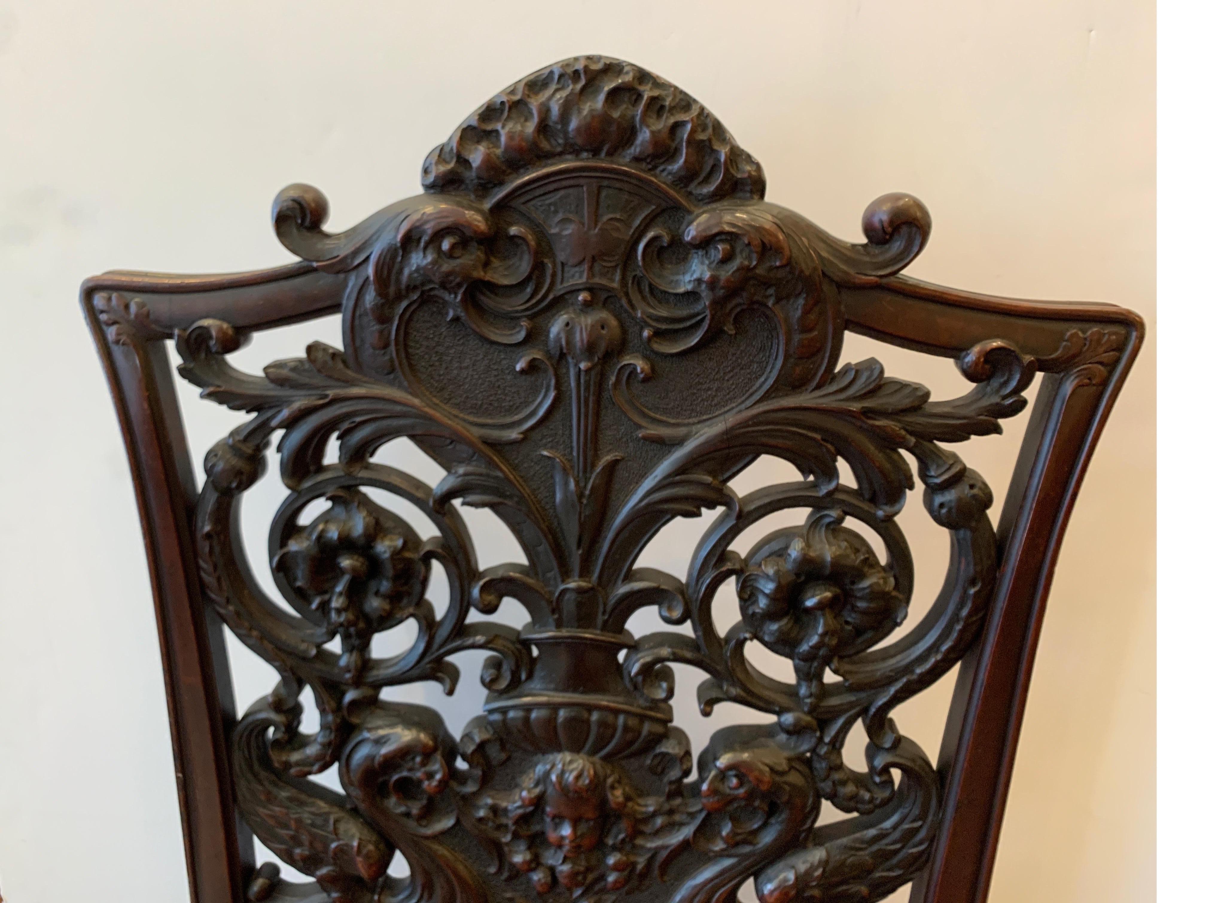 Exceptionally Well Carved Mahogany Chair with Floral Design, Cherub, circa 1880 In Good Condition For Sale In Lambertville, NJ