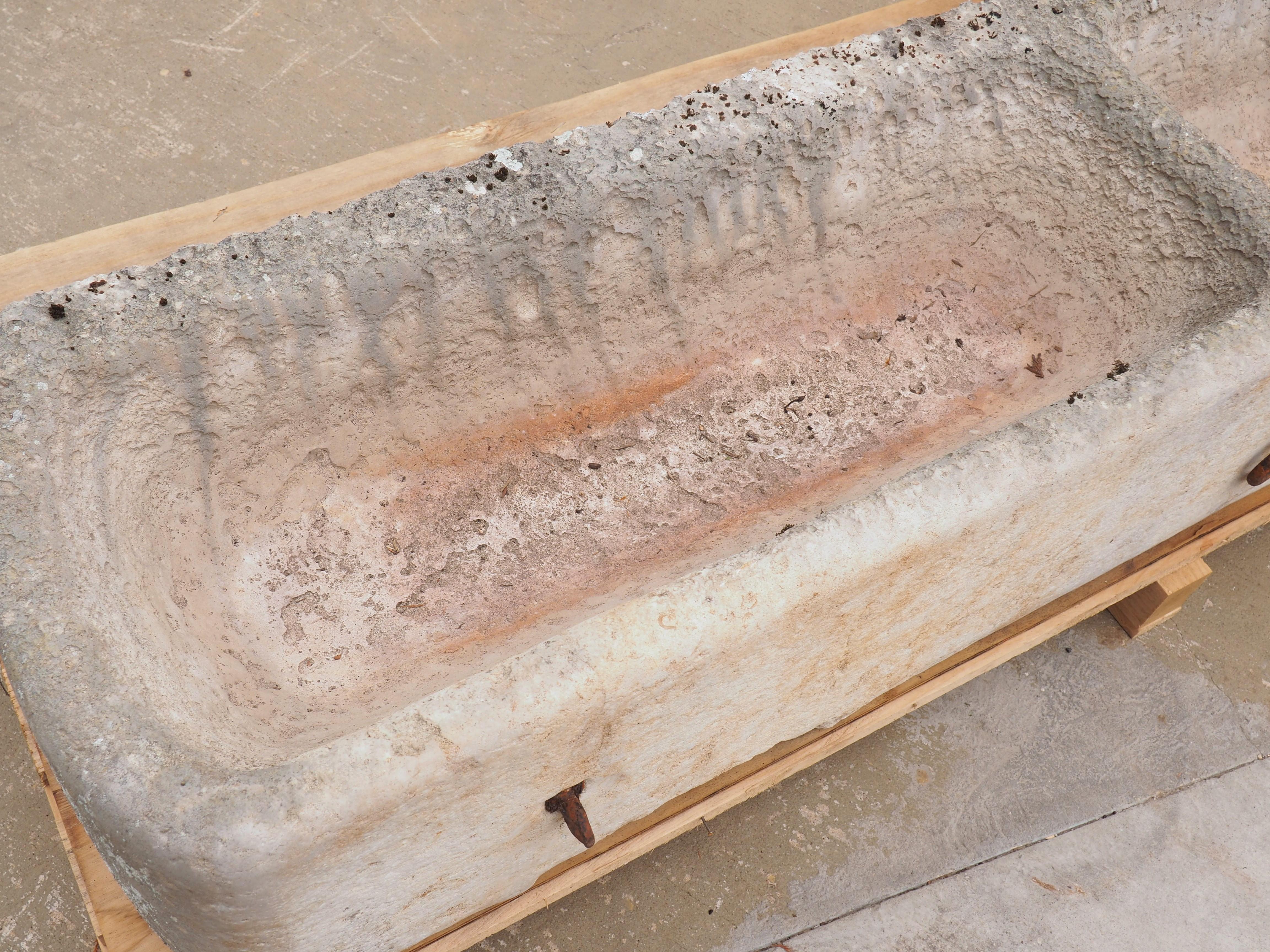 Late 19th Century Circa 1880 French Burgundy Stone Double Trough with Iron Horse Ties