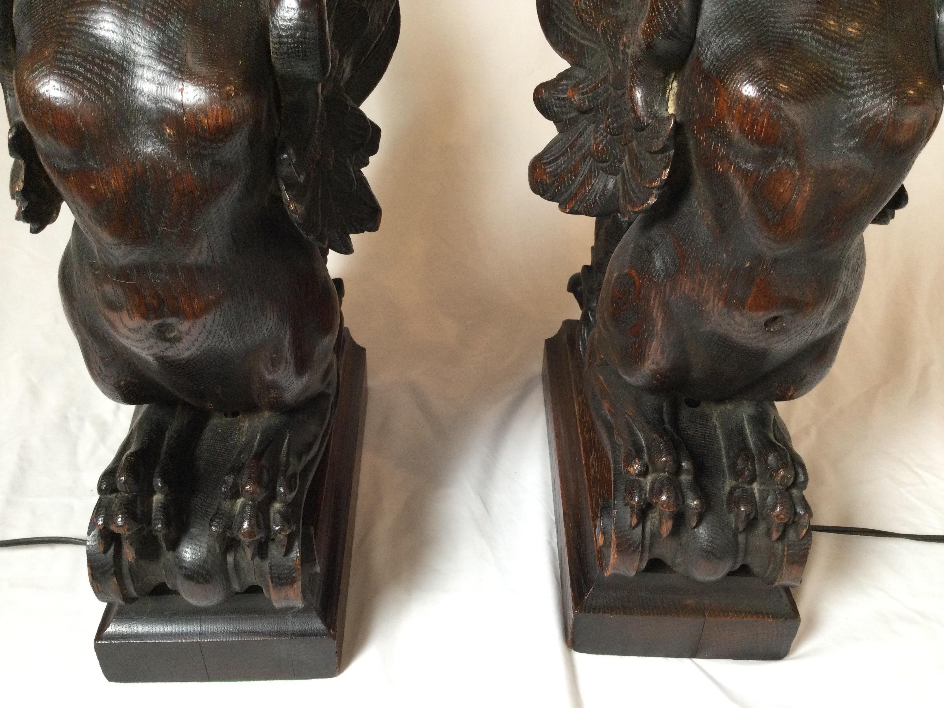 Oak Circa 1880 Pair of Great Hand Carved Wood Winged Caryatids-Griffins Now as Lamps For Sale