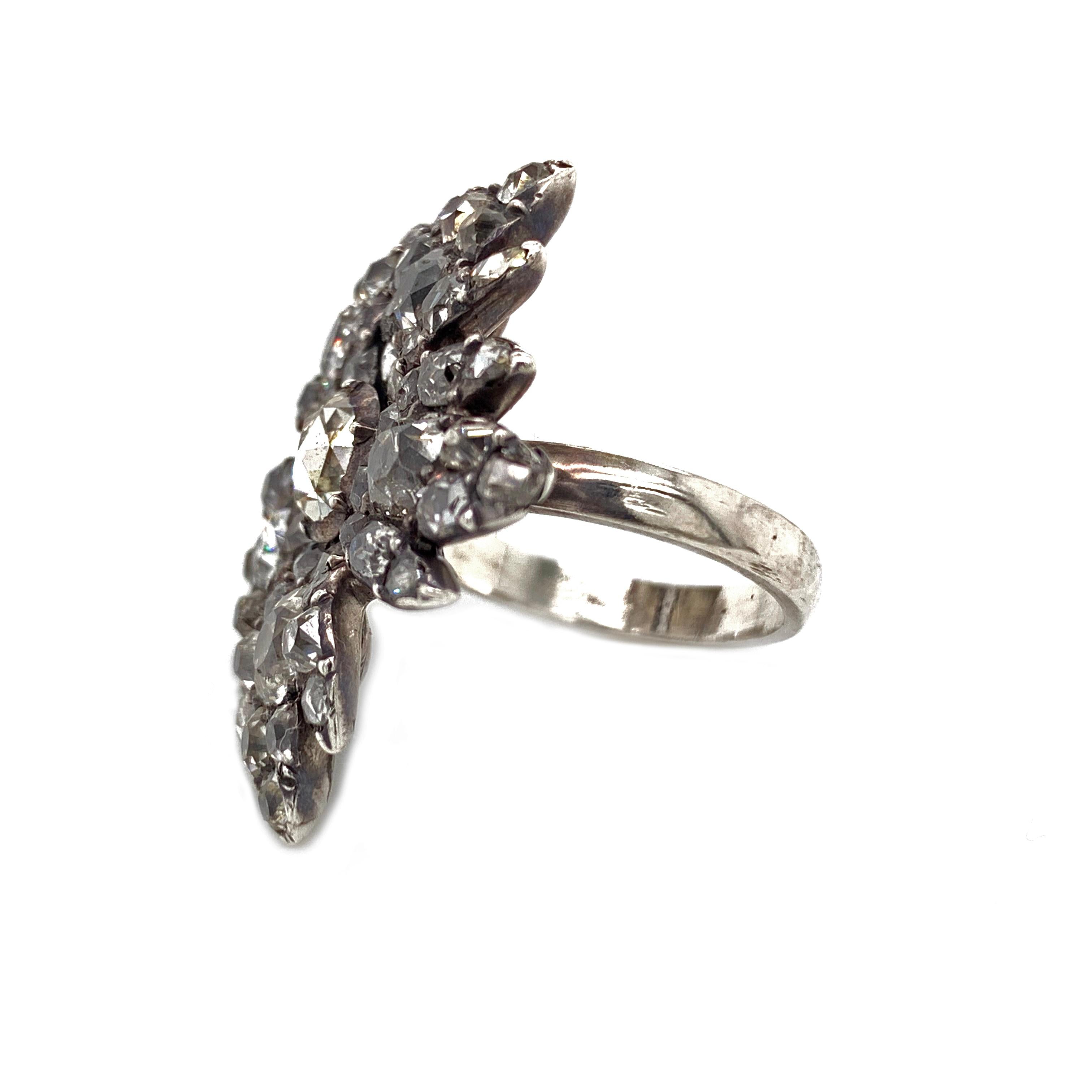 A, Circa 1880 Diamond Flower Ring. This, lovely antique ring is crafted in gold with silver over it. With, 5cts in diamonds the ring only weighs 9.1 grams. It is a US size 6.25. A, very beautiful antique timepiece and great rare treasure to add to a
