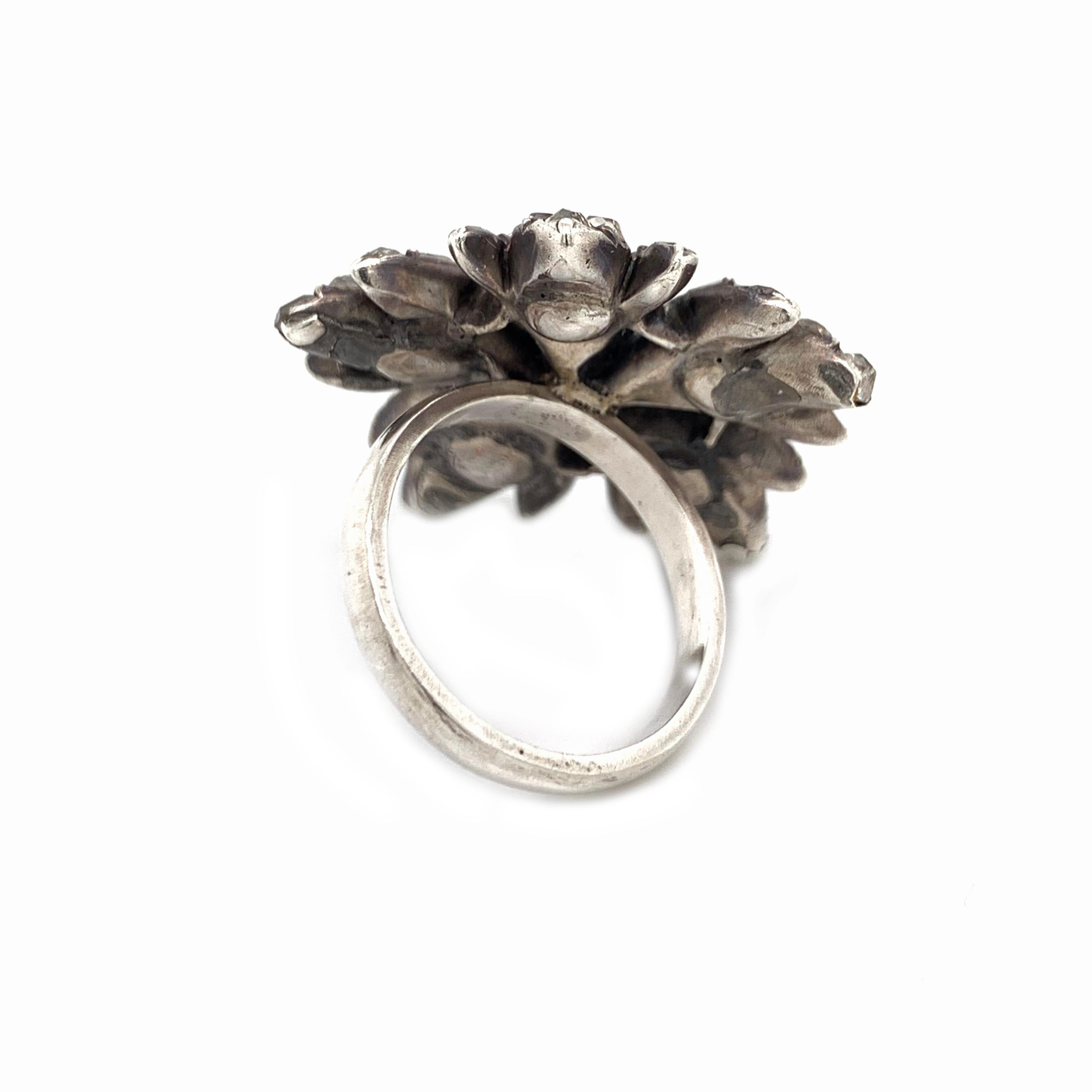Oval Cut Silver on Gold Diamond Flower Ring, circa 1880 For Sale
