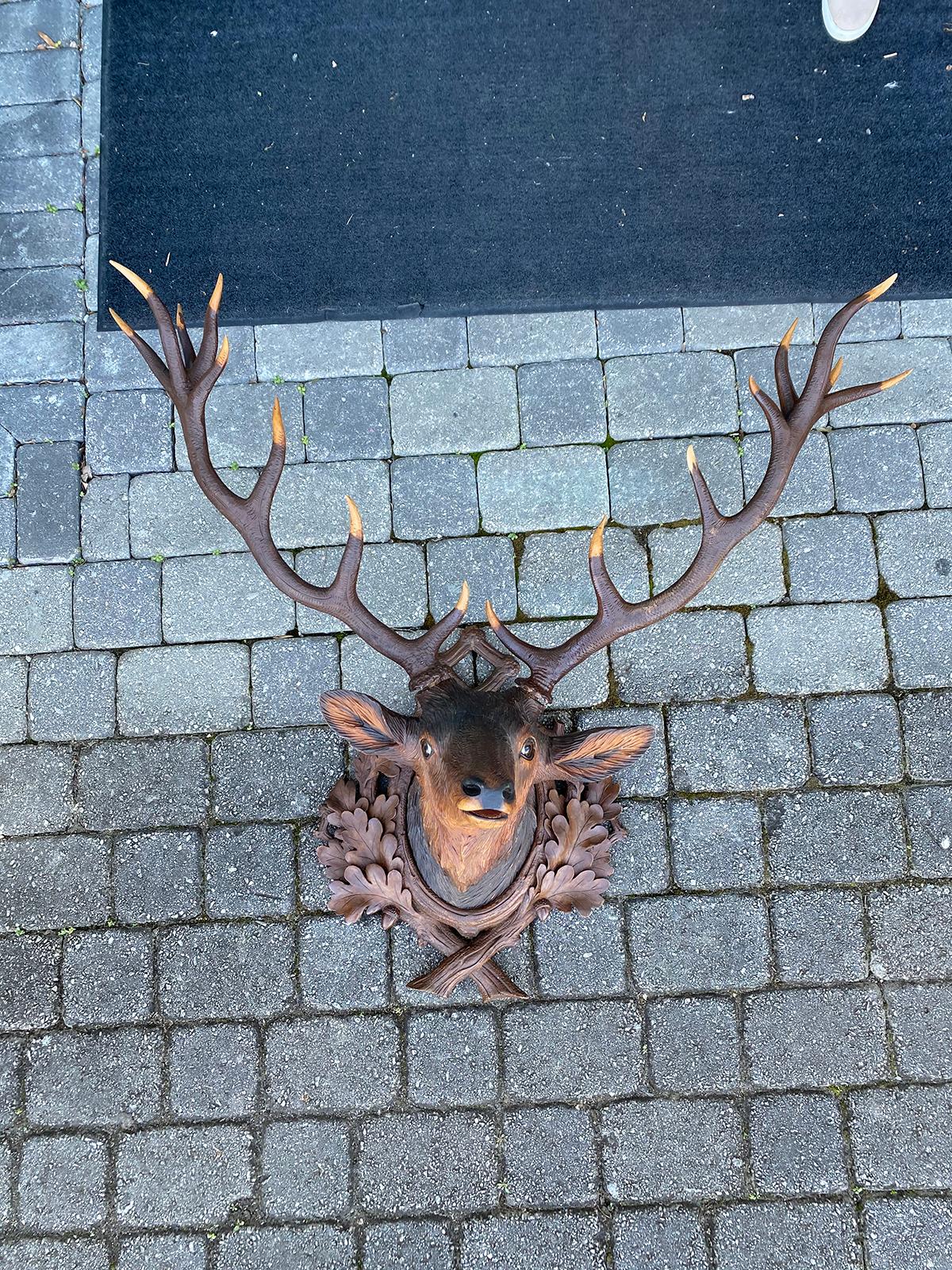 Carved black forest stag head, circa 1880s.
Measures: Overall: 40
