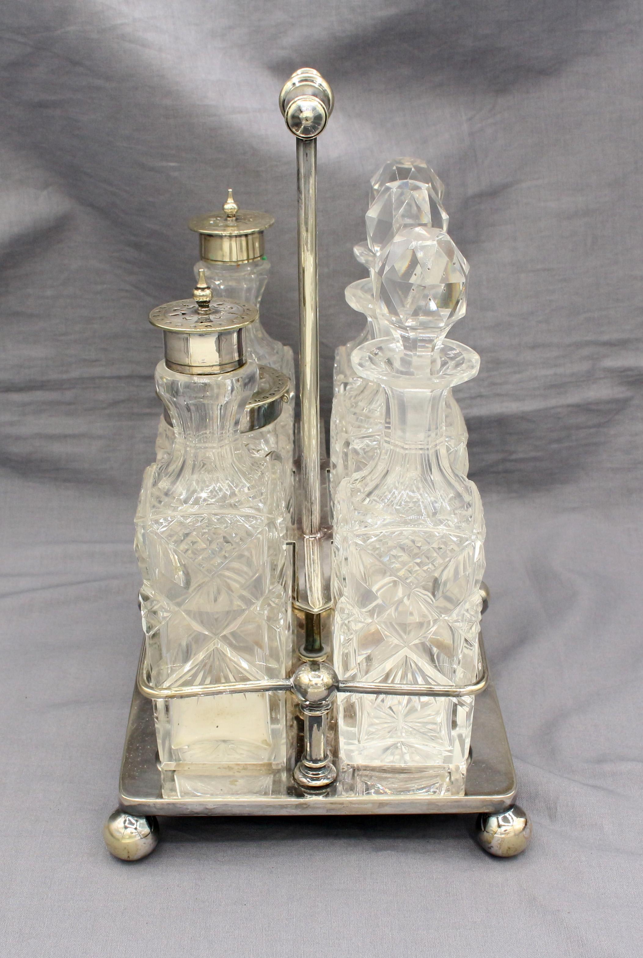 Silver on nickle & cut glass 6 bottle cruet stand, c.1880s, English. All original, fine condition bottles. Some nickle showing.
8