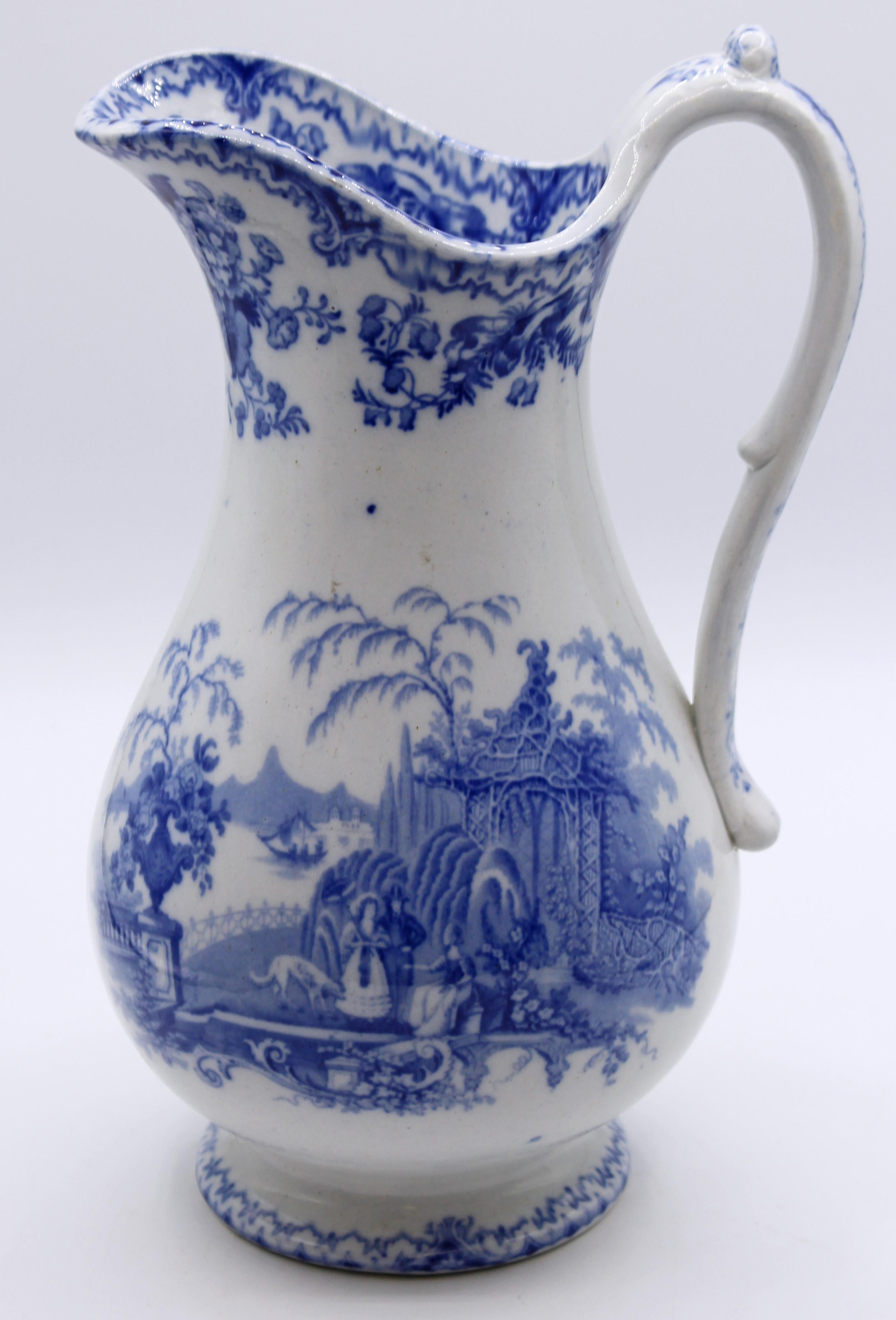Blue and white transferware pitcher, c.1880, romantic scene. Each side with romanticized views of Westerners in a Chinese setting. 12 7/8