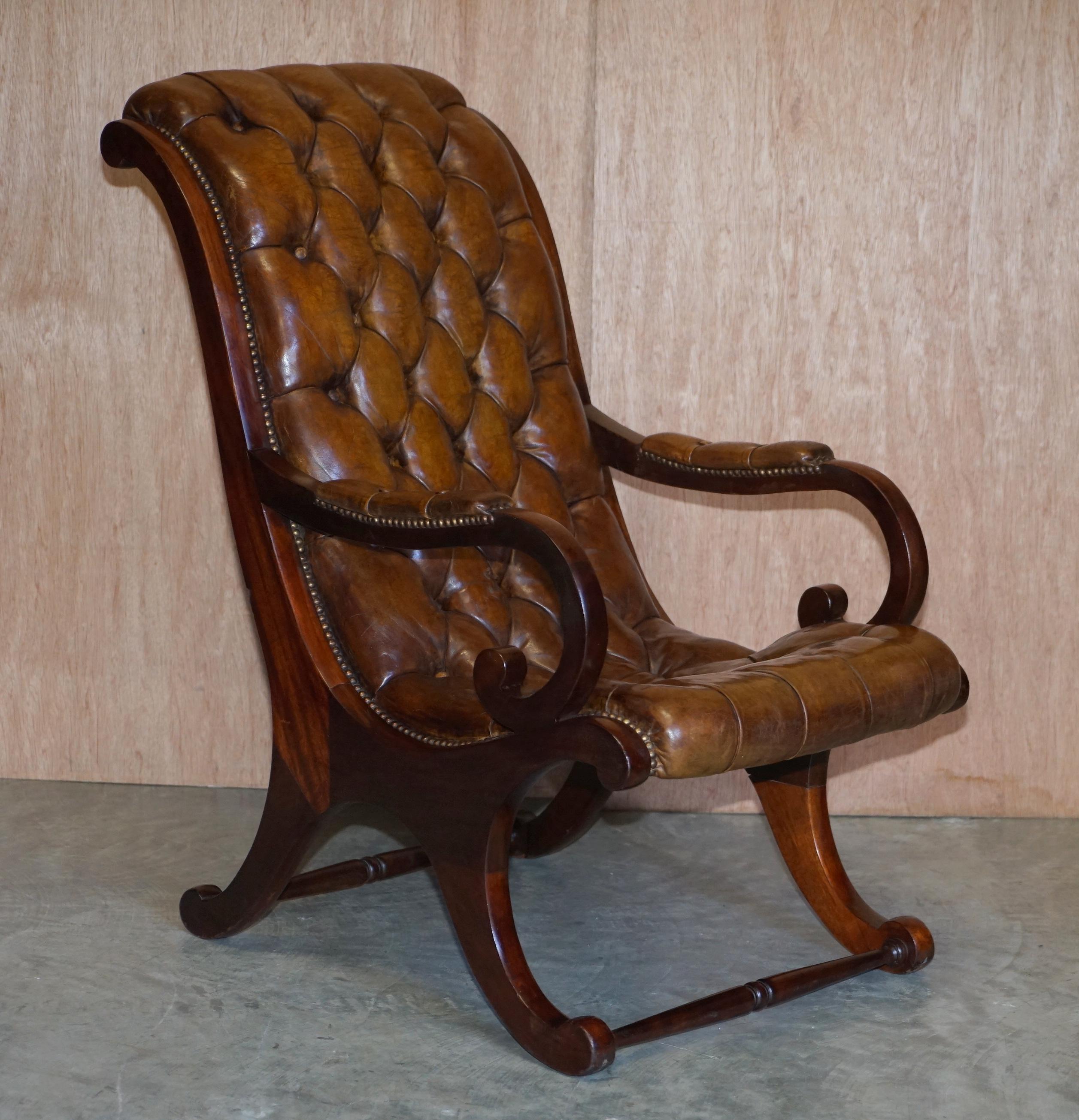 We are delighted to offer for sale this lovely original circa 1890 Antique Victorian Chesterfield brown leather Library reading armchair and matching ottoman

A very good looking period pair, the leather patina is sublime, absolutely sublime, it