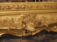 Circa 1890 French Belle Époque Louis XV Style Giltwood Mirror with Crowned Crest