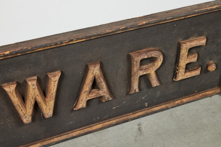 American Circa 1890 Hardware Store Wood Trade Sign Carved Smaltz Black and Gold Paint For Sale