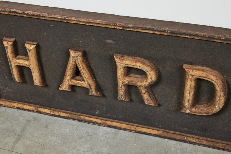 Hand-Painted Circa 1890 Hardware Store Wood Trade Sign Carved Smaltz Black and Gold Paint For Sale