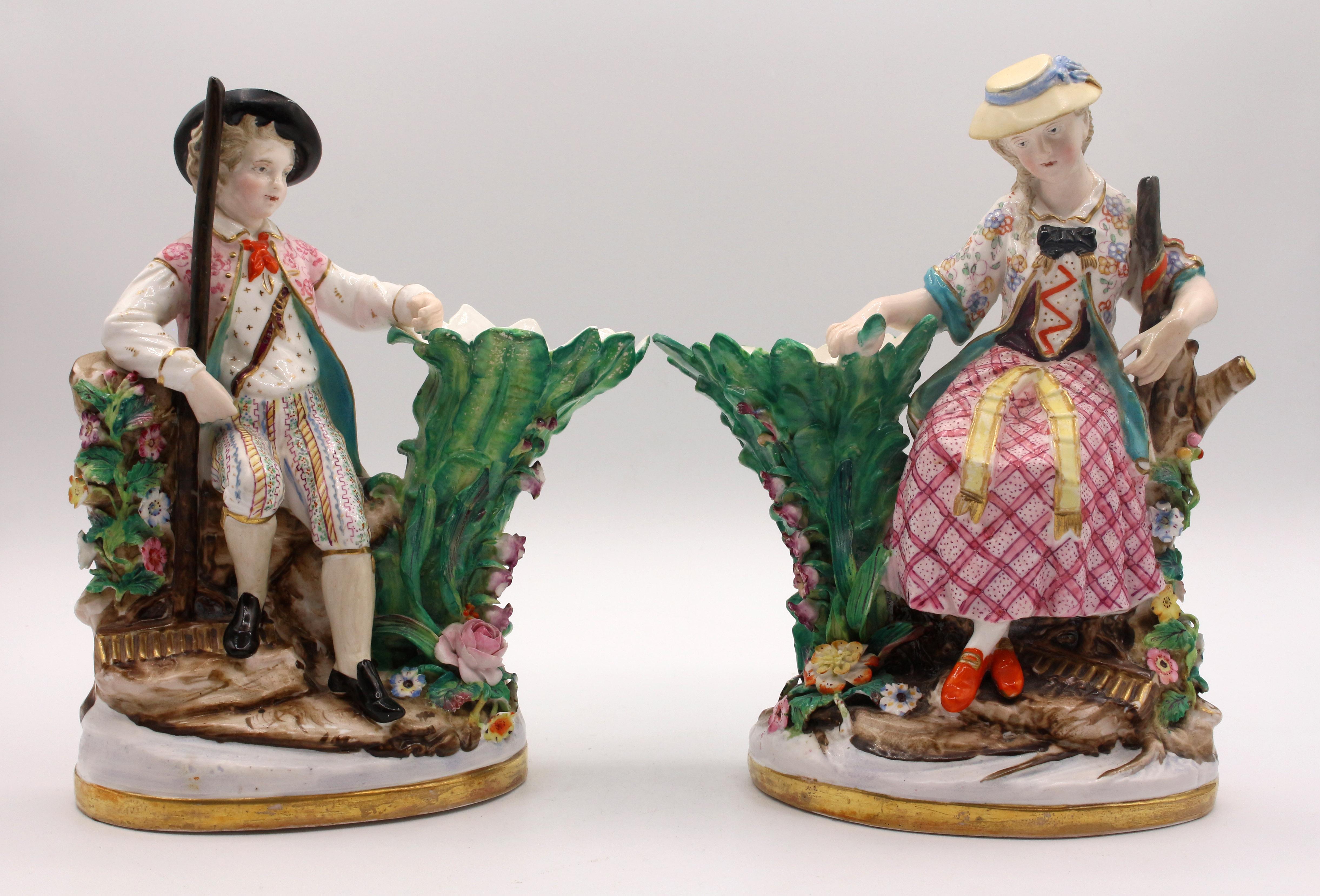 Circa 1890 pair of gardener figure porcelain spill vases by Schierholz factory, German. 1865-1907 marks. Each seated on wooden 