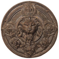 Circa 1890 Round Cast Iron Haussmann Building Plaque with Lion Mascaron