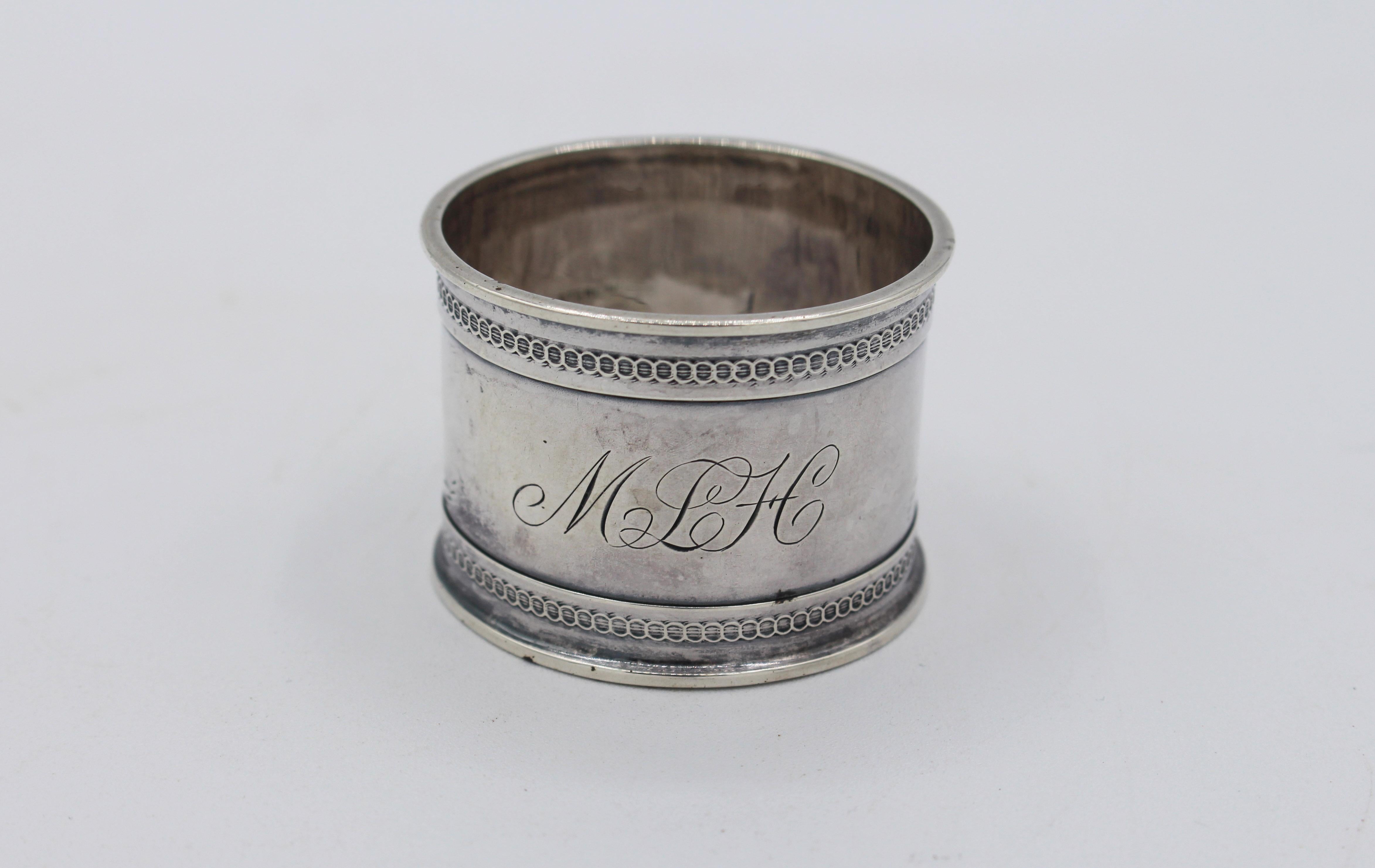 Handsome American sterling silver napkin ring, c.1890. Faux bright cut and monogram 