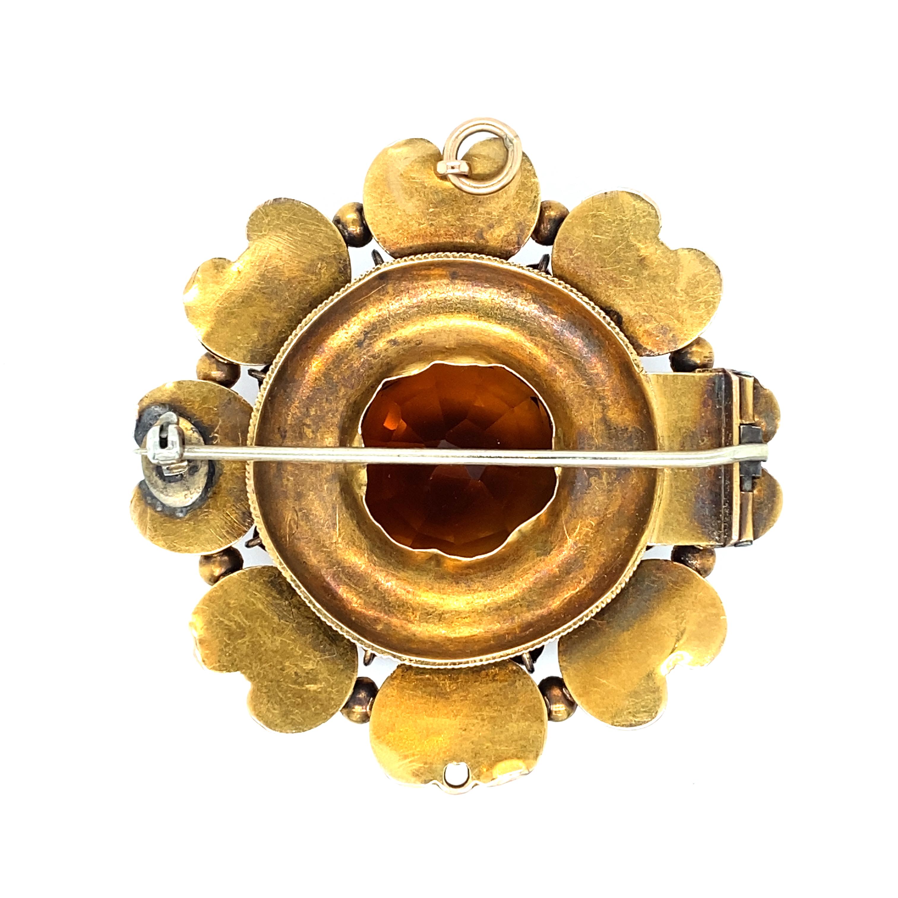 Women's or Men's Circa 1890s 20.0 carat Citrine and Eight Ram Head Brooch in 15 Karat Gold  For Sale