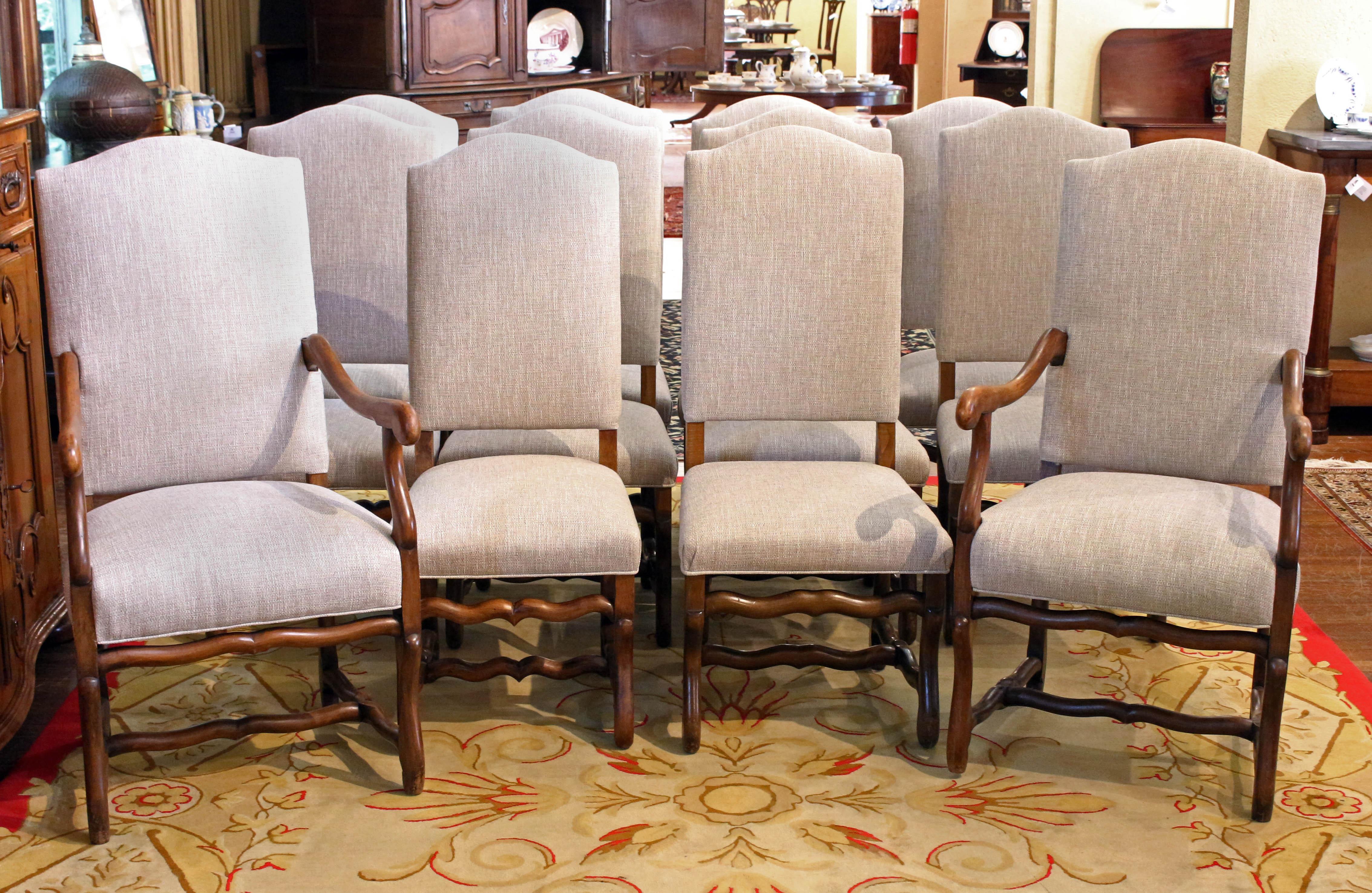 Circa 1890s set of 12 dining chairs, French, Louis XIII style. In the ever popular 