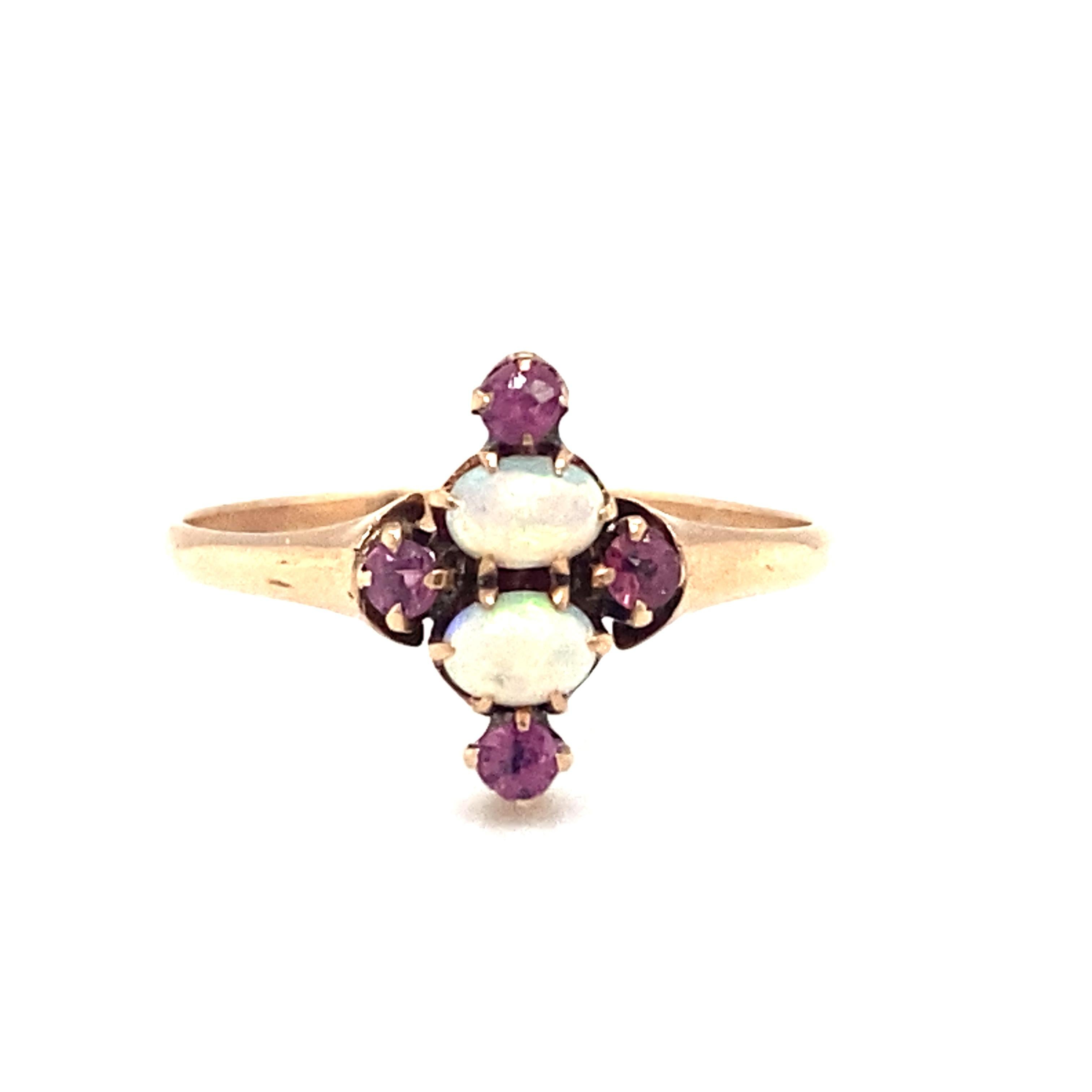 Late Victorian Circa 1890s Pink Sapphire and Ethiopian Opal Ring in 9 Karat Gold For Sale