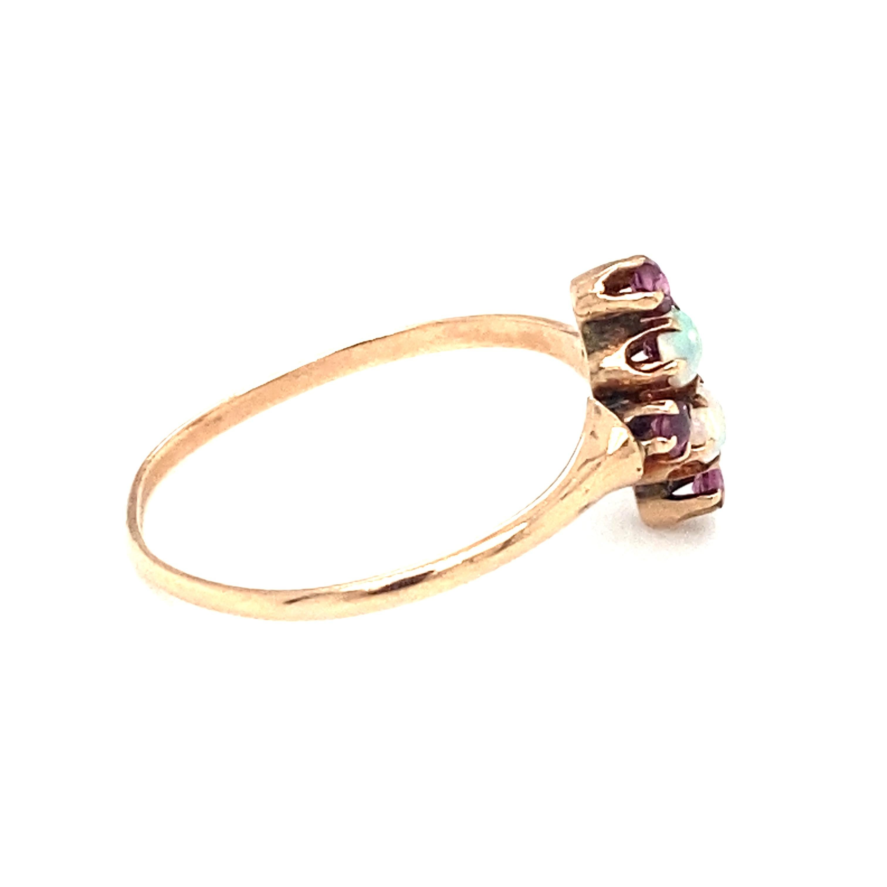 Cabochon Circa 1890s Pink Sapphire and Ethiopian Opal Ring in 9 Karat Gold For Sale