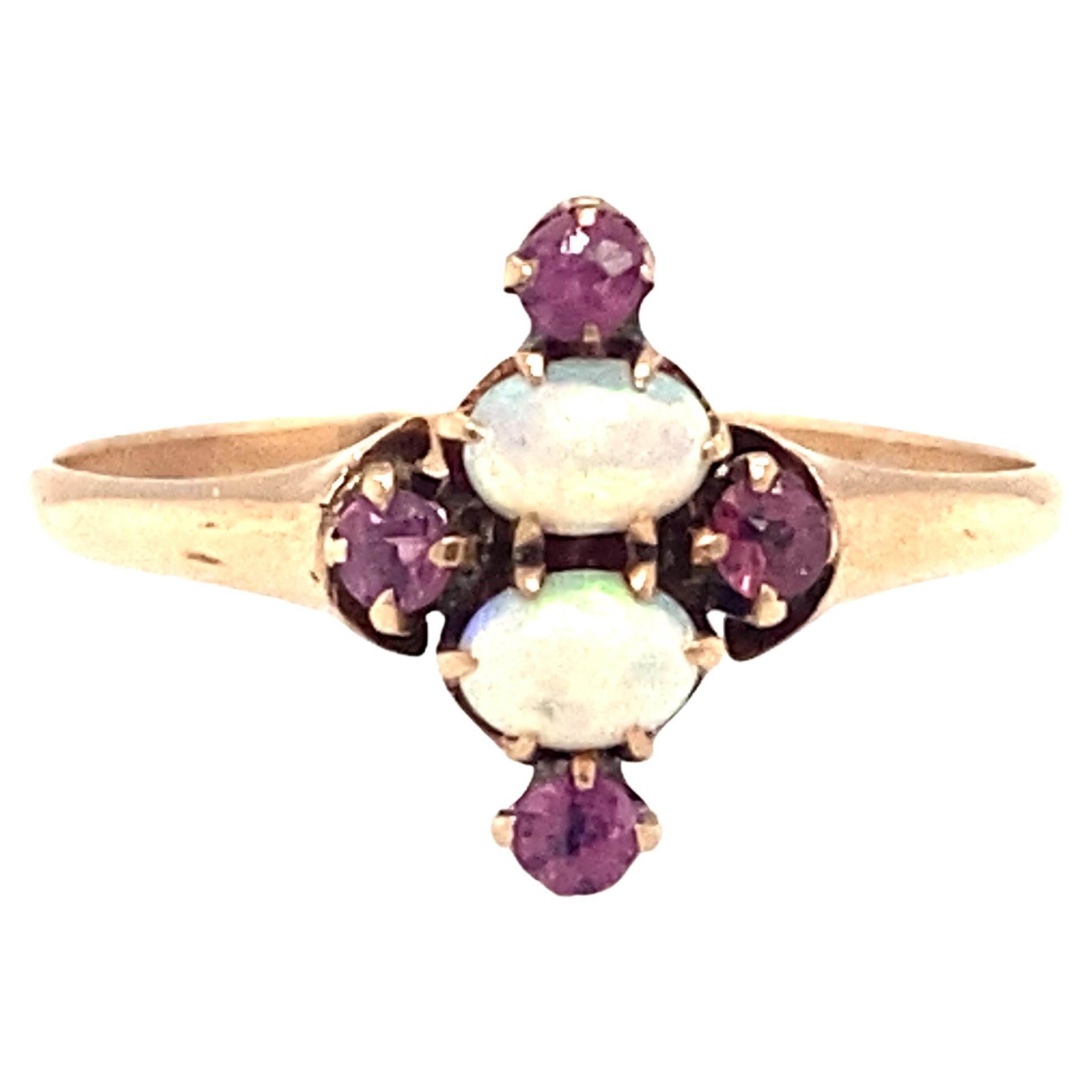 Circa 1890s Pink Sapphire and Ethiopian Opal Ring in 9 Karat Gold For Sale