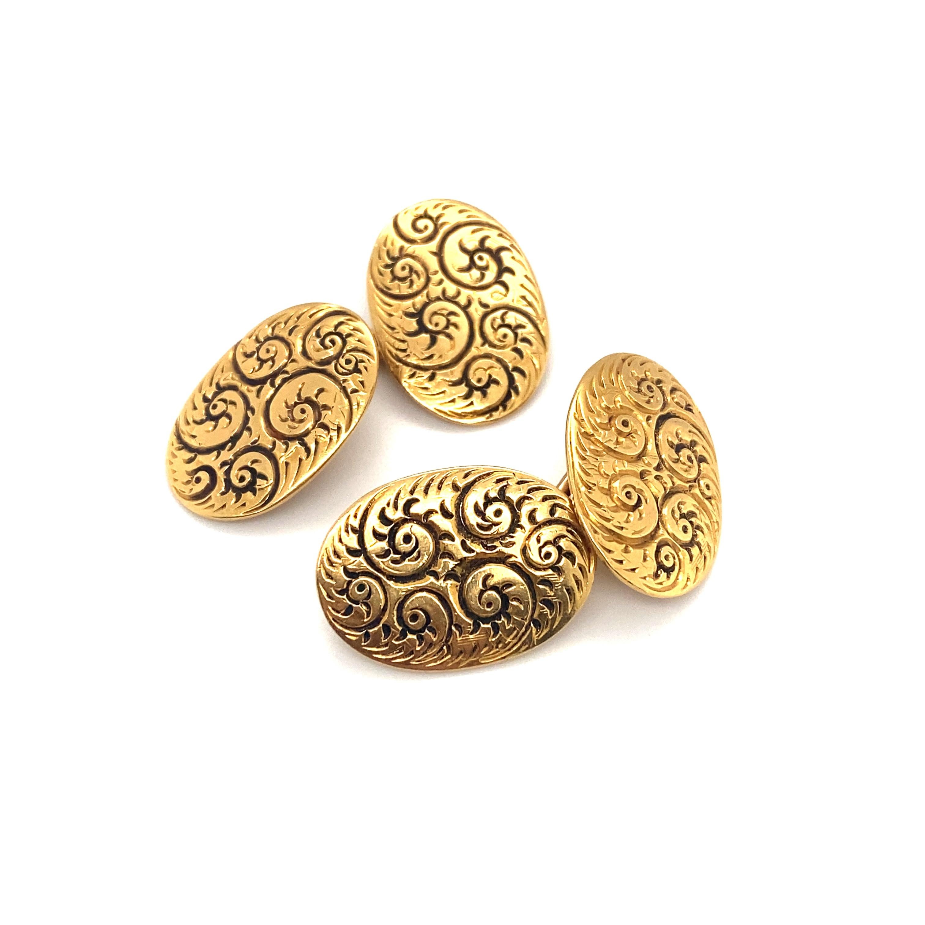 Item Details: This pair of cufflinks from Tiffany & Co. has an etched design and is a perfect Victorian piece to wear with a formal ensemble.

Circa: 1890s
Metal Type: 18k gold
Weight: 11.9g

