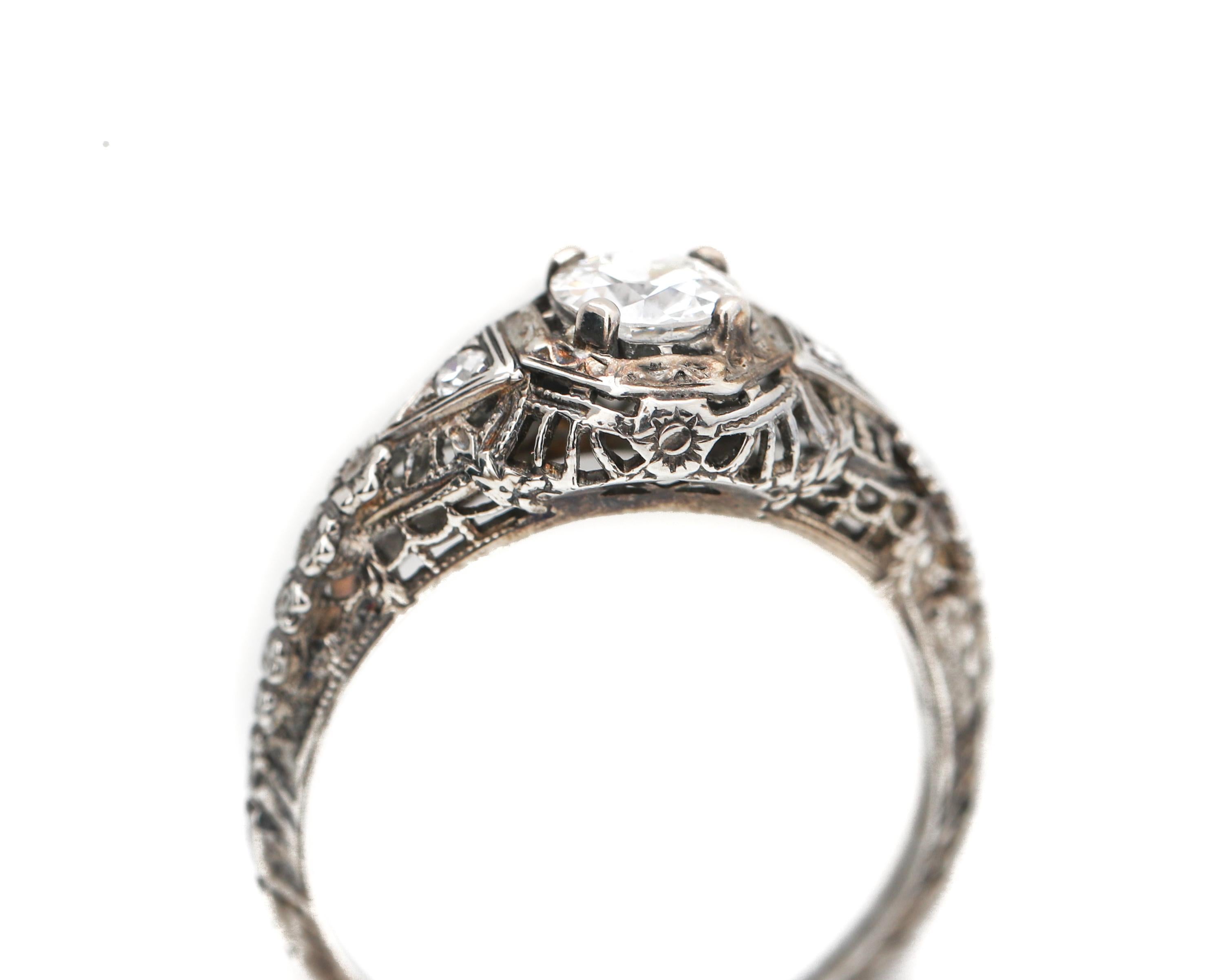 Late Victorian Victorian Filigree .60 Carat Diamond White Gold Engagement Ring, circa 1890s