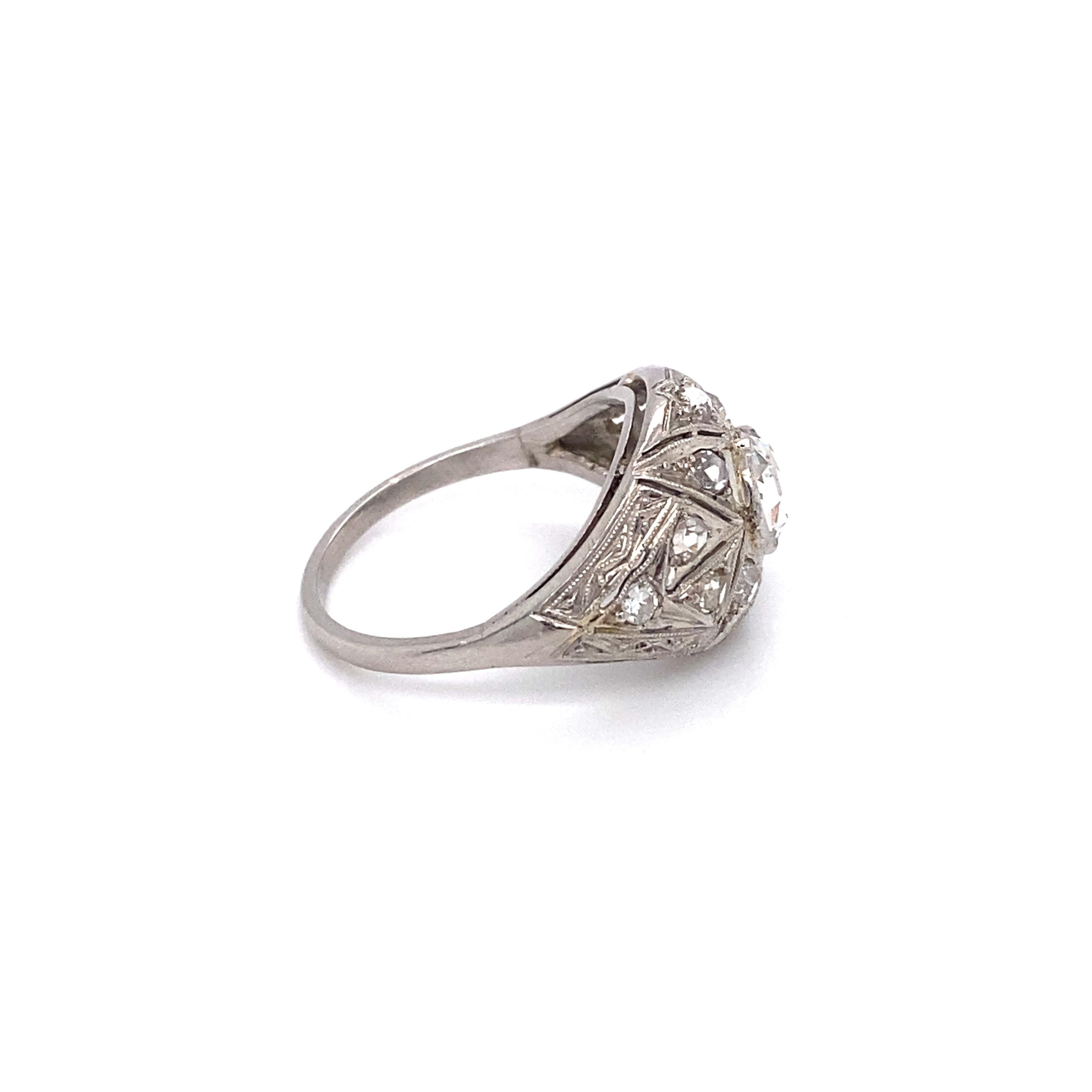 Circa: 1890s
Metal Type: Platinum and 14K White Gold
Size: US 6.75
Weight: 4.2g

Diamond Details:

Cut: Rose cut
Carat: Center is approximately 0.50 carats, total diamond weight 0.75 carat total weight
Color: K-L
Clarity: VS-I1