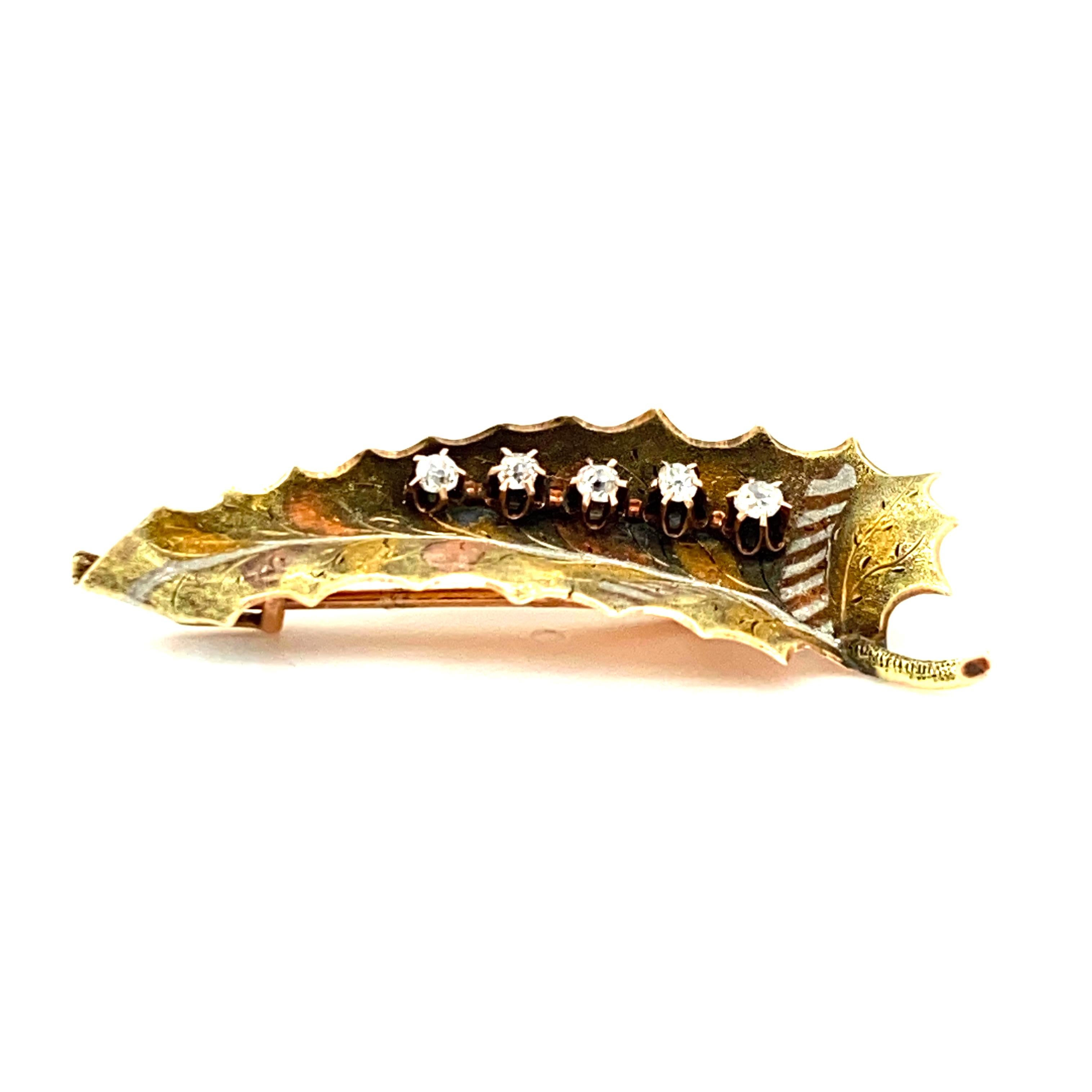 This hand-crafted multi-tone gold leaf-motif brooch uses the mixed metals technique practiced in turn-of-the-century Newark, New Jersey - back when Newark was a center of the jewelry industry with craftsmanship rivaling that of fine French and