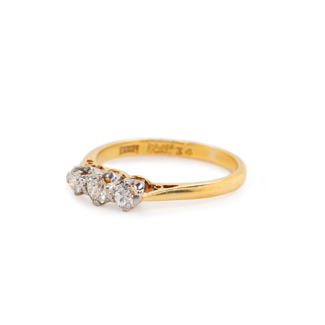 Circa 1900 Antique Edwardian Platinum 18K Yellow Gold Three Stone Diamond Ring In Excellent Condition For Sale In Houston, TX