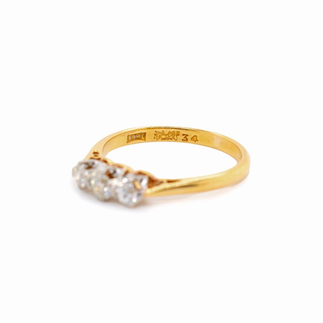 Women's Circa 1900 Antique Edwardian Platinum 18K Yellow Gold Three Stone Diamond Ring For Sale