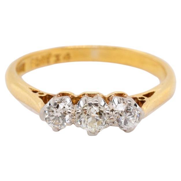 Circa 1900 Antique Edwardian Platinum 18K Yellow Gold Three Stone Diamond Ring For Sale