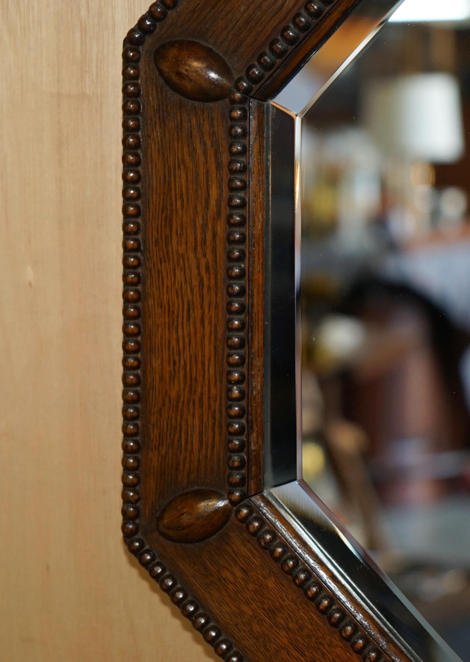Scottish CIRCA 1900 ANTIQUE SCOTTiSH HAND CARVED BOBBIN OAK WALL MIRROR BEVELLED GLASS For Sale