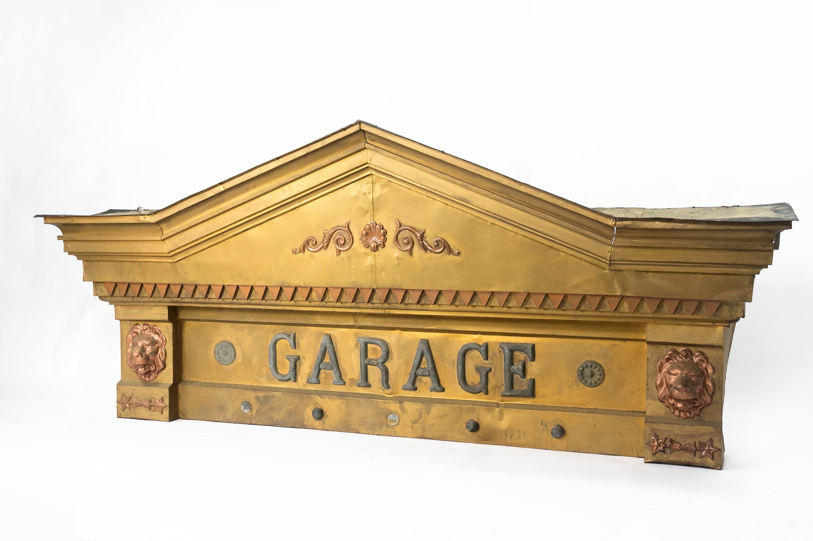 This beautifully preserved store facade is in the Roman Revival style and came off of the oldest building in Clinton, Wisconsin. The building was originally a livery, and with the invention of the automobile eventually became a garage. The tin has