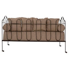 Circa 1900 Black Iron Upholstered Daybed With Cushions On Casters
