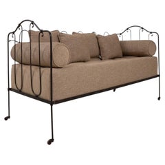 Circa 1900 Black Iron Upholstered Daybed With Cushions On Casters