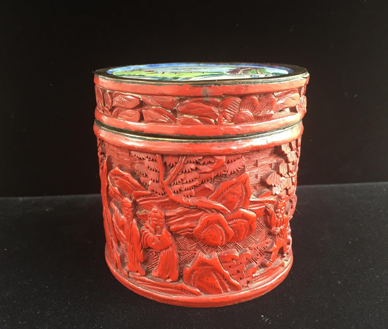 This extraordinary cinnabar lacquer box is a masterpiece and exemplary among the highest level of intricate masterful ancient Chinese traditional carving. The lacquer, which is applied in layers to the metal body, is carved deeply with scenery and