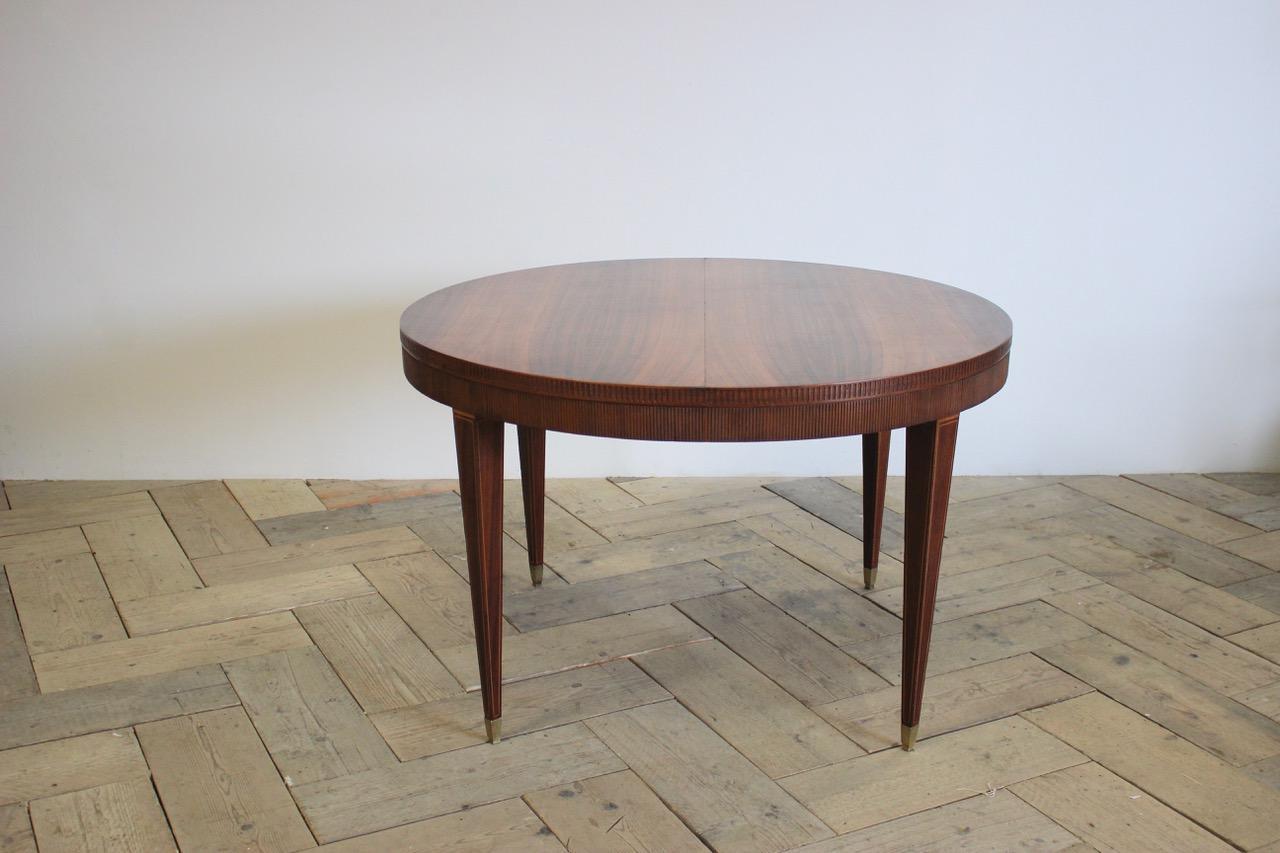 A very elegant and with great proportions, circa 1900 continental centre table in rosewood with brass caps, that will work very well in either a Classic or c contemporary setting.
It could also work as a dining table.