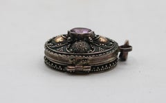 Circa 1900 Continental Sterling, Gold, and Amethyst Locket
