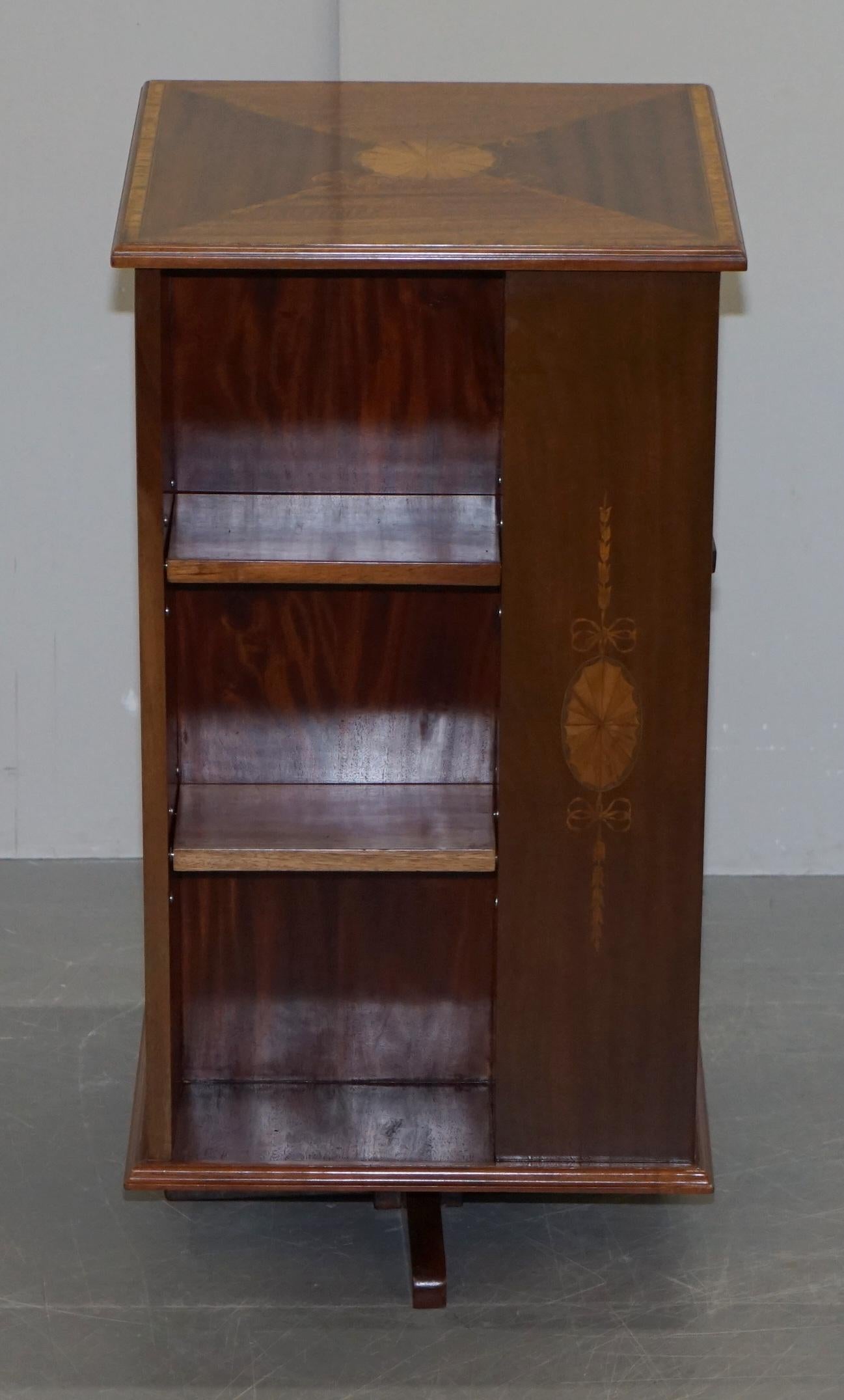 We are delighted to offer for sale this stunning circa 1900 burr walnut and mahogany revolving bookcase with Sheraton inlay to the top

An exceptionally well made and highly decorative library bookcase. This is a very versatile piece of furniture