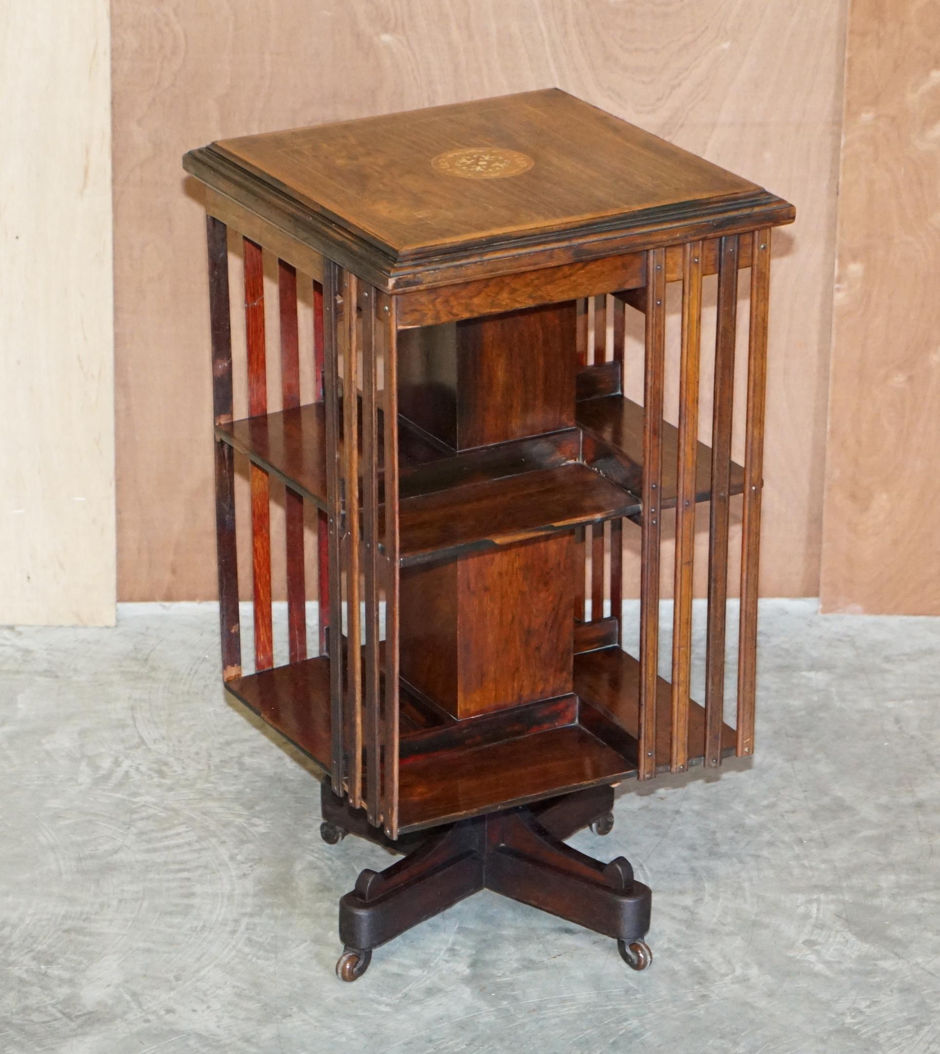 We are delighted to offer for sale this stunning circa 1900 hardwood revolving bookcase with Sheraton inlay to the top.

An exceptionally well made and highly decorative library bookcase or book table. This is a very versatile piece of furniture