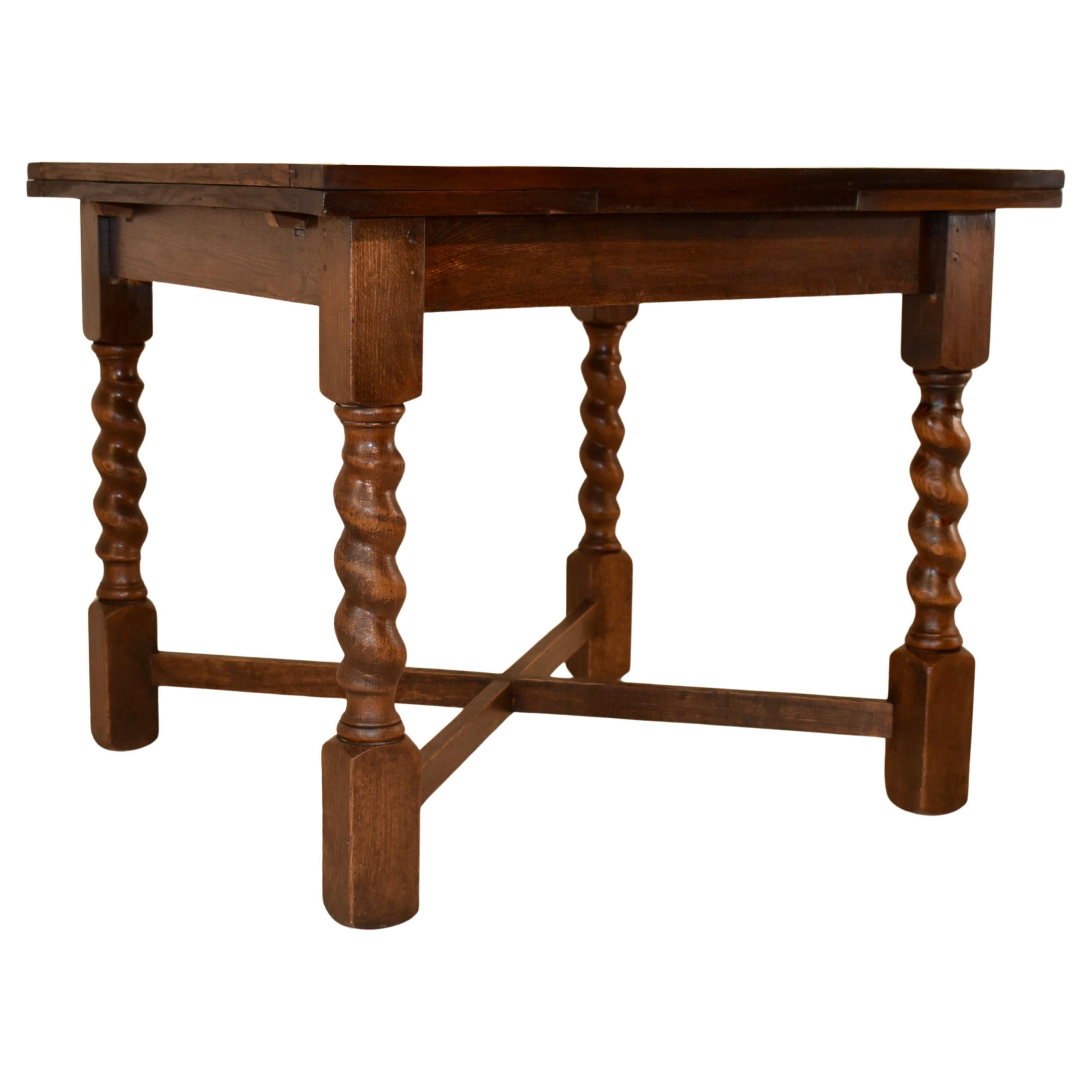 Circa 1900 English Oak Table with Two Draw-Leaves
