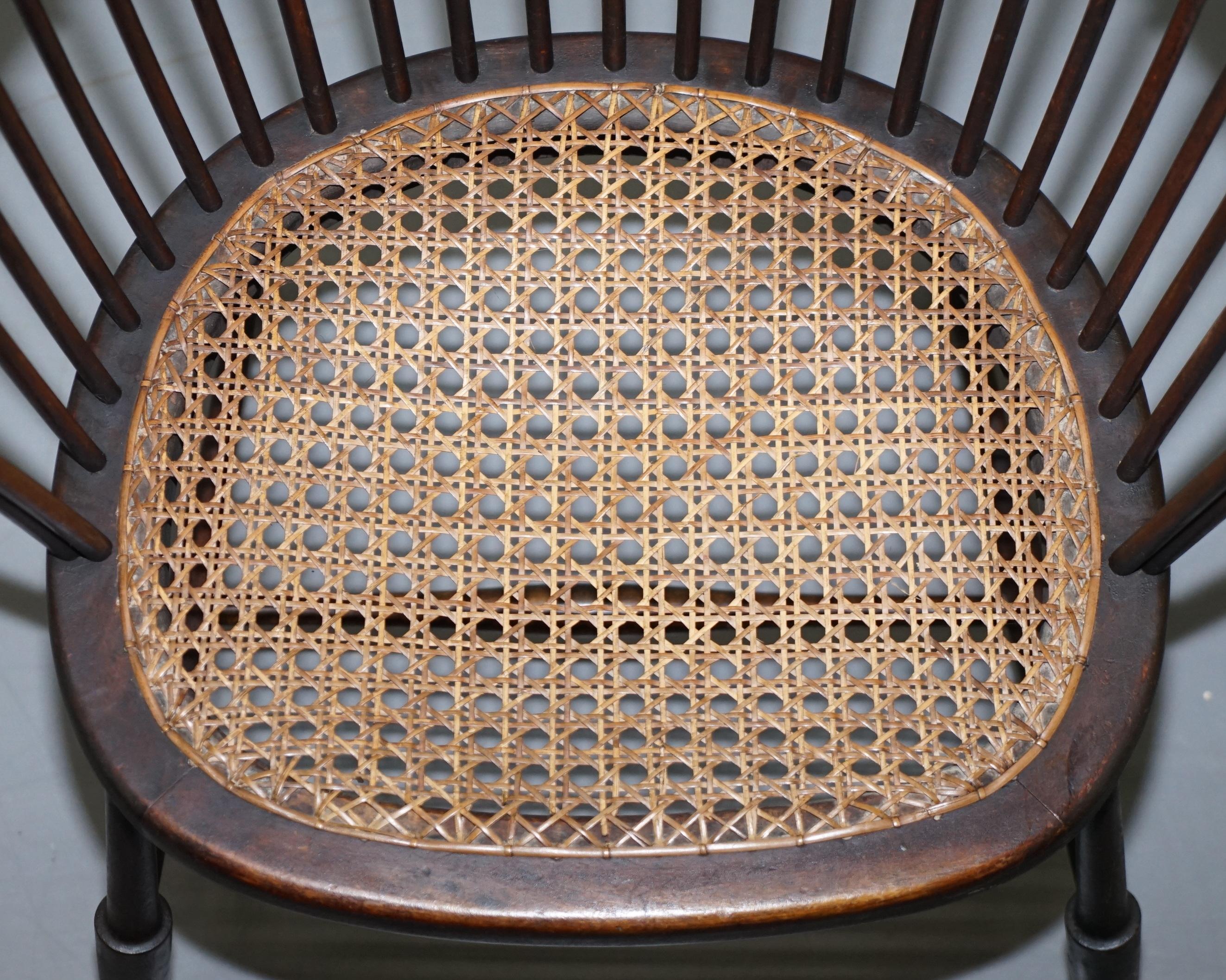 Early 20th Century English Windsor Comb Spindle Back Armchair with Rare Rattan Seat, circa 1900
