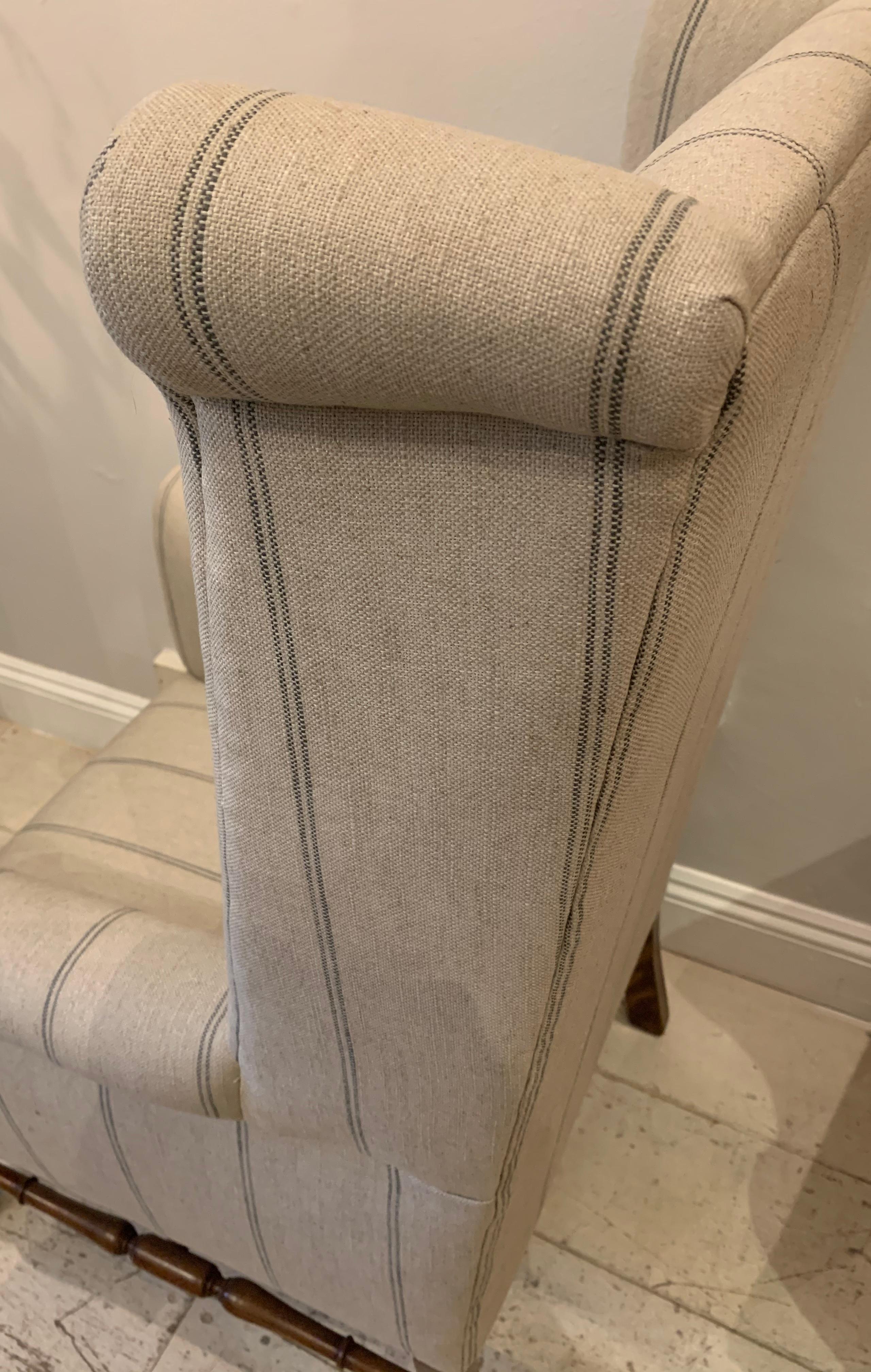 Late 19th Century Circa 1900 English Wingback Armchair with Walnut Legs in a Neutral Linen Fabric