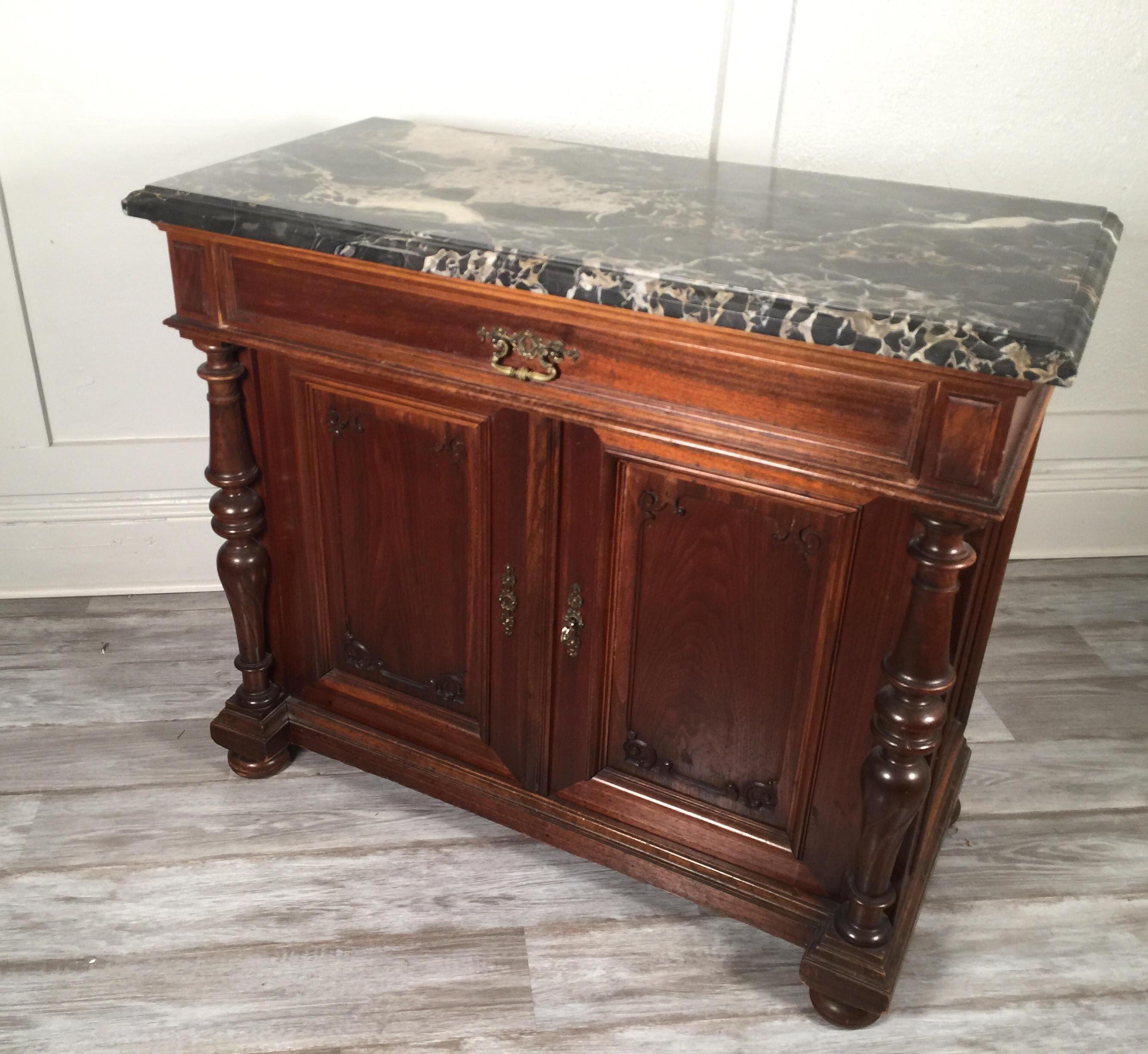 European walnut carved marble-top, two-drawer, two-door cabinet, bar
Beautiful Italian marble, chest, server or could be used as a dry bar
Dimensions: 20
