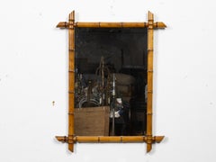 Specchio rettangolare in finto bambù del 1900 con pinne d'angolo decorative