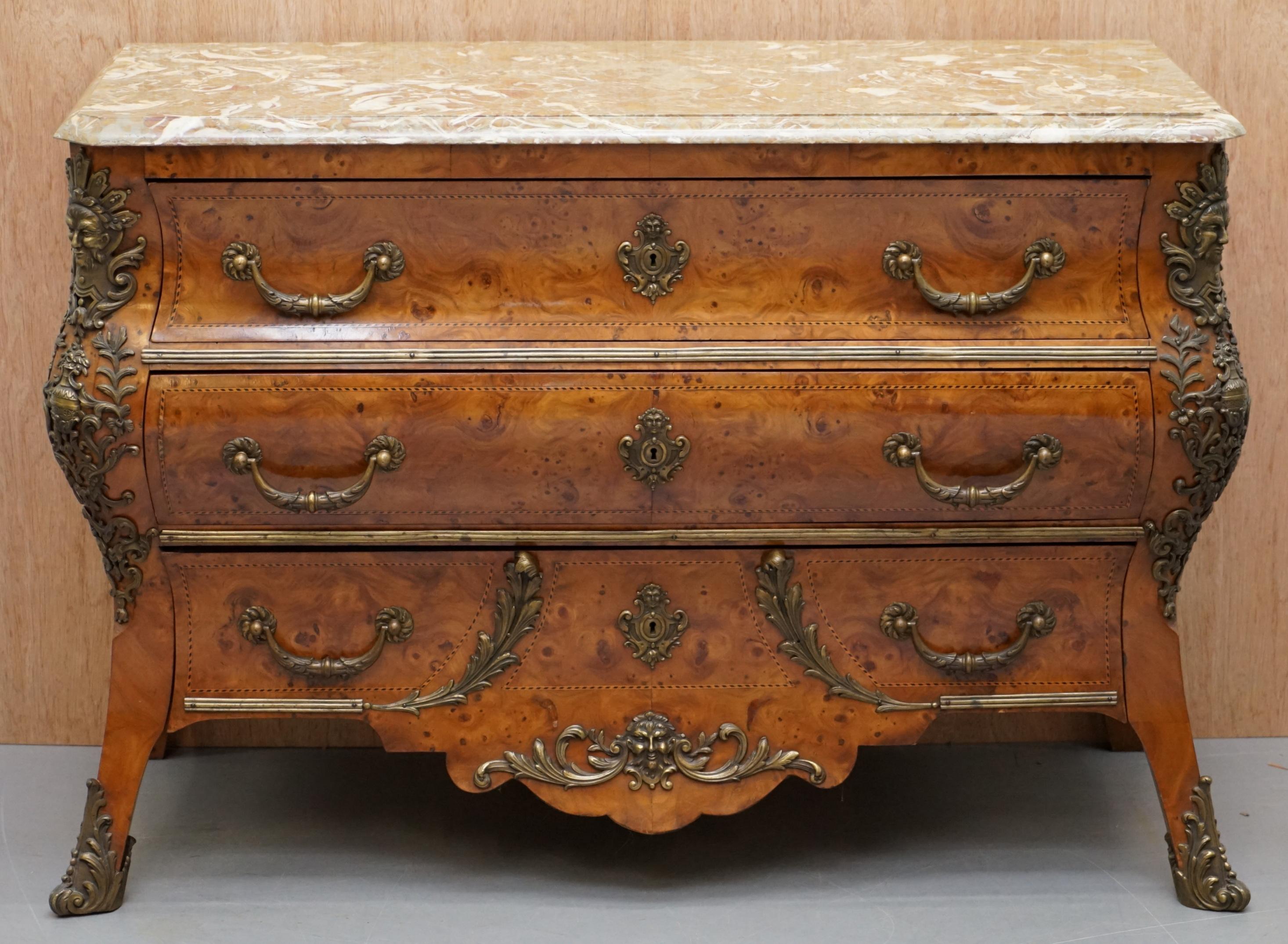 We are delighted to offer for sale this absolutely stunning circa 1900 French burr walnut with all solid bronze fixtures and fittings bombe chest of drawers finished with a solid marble top 

A very good looking well made and extremely decorative