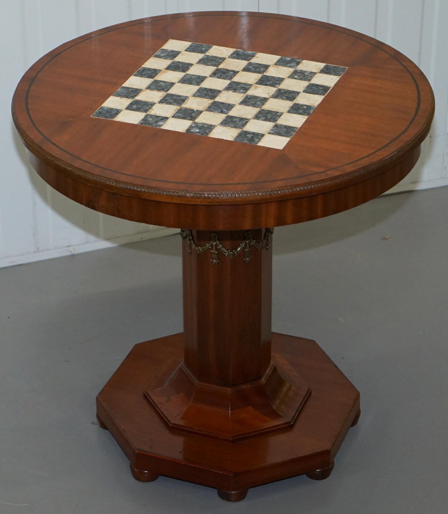 We are delighted to offer for sale this stunning fully restored Mahogany with ormolu floral detailing French Empire marble Chess table

A very good looking well made and function piece of furniture, extremely decorative, the piece has been fully
