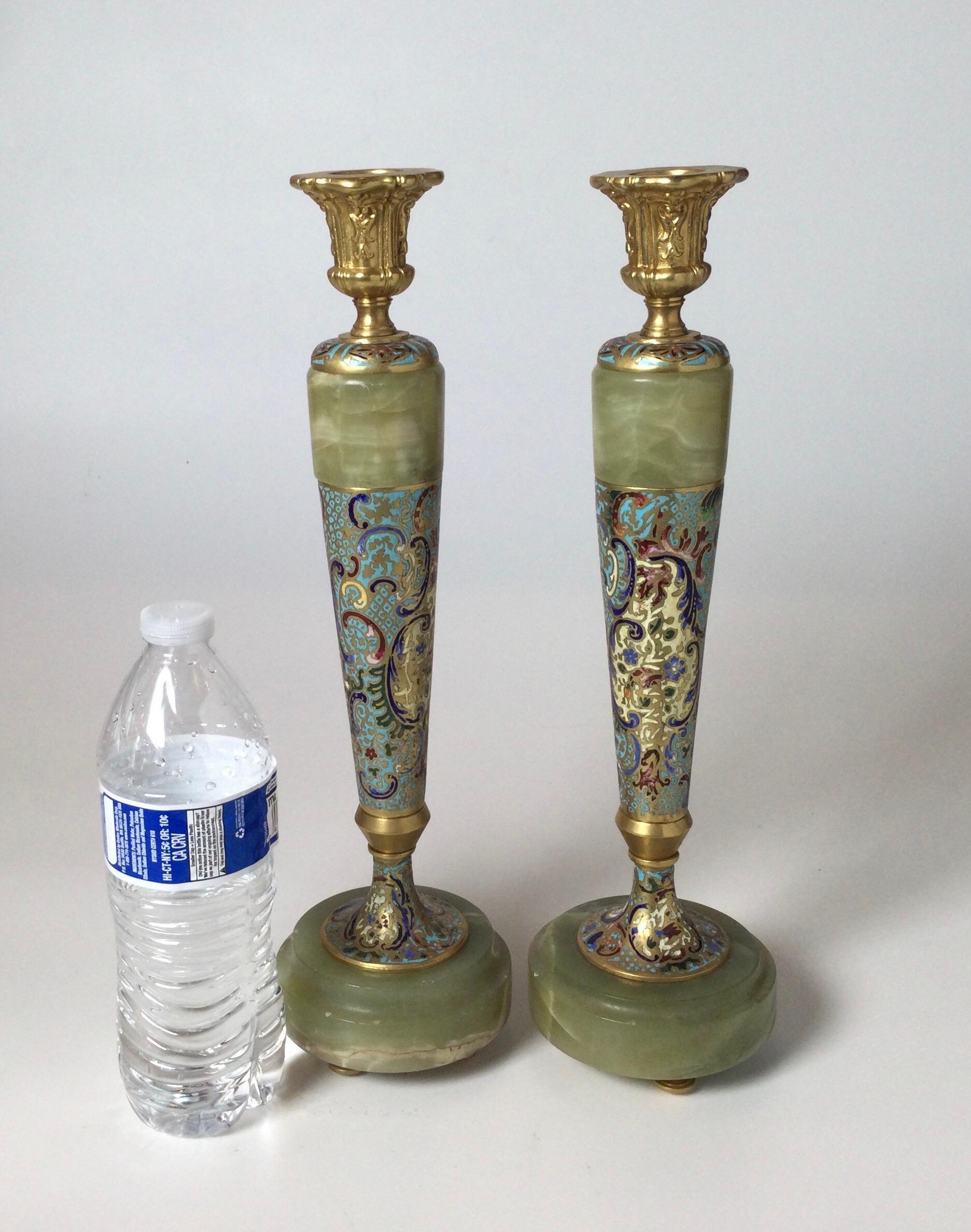 Circa 1900 gilt bronze Champleve' and onyx tall candlesticks
Beautiful example of French 19th century hand enameled candlesticks, nicely weighted with onyx bases.
Dimensions: 13.75