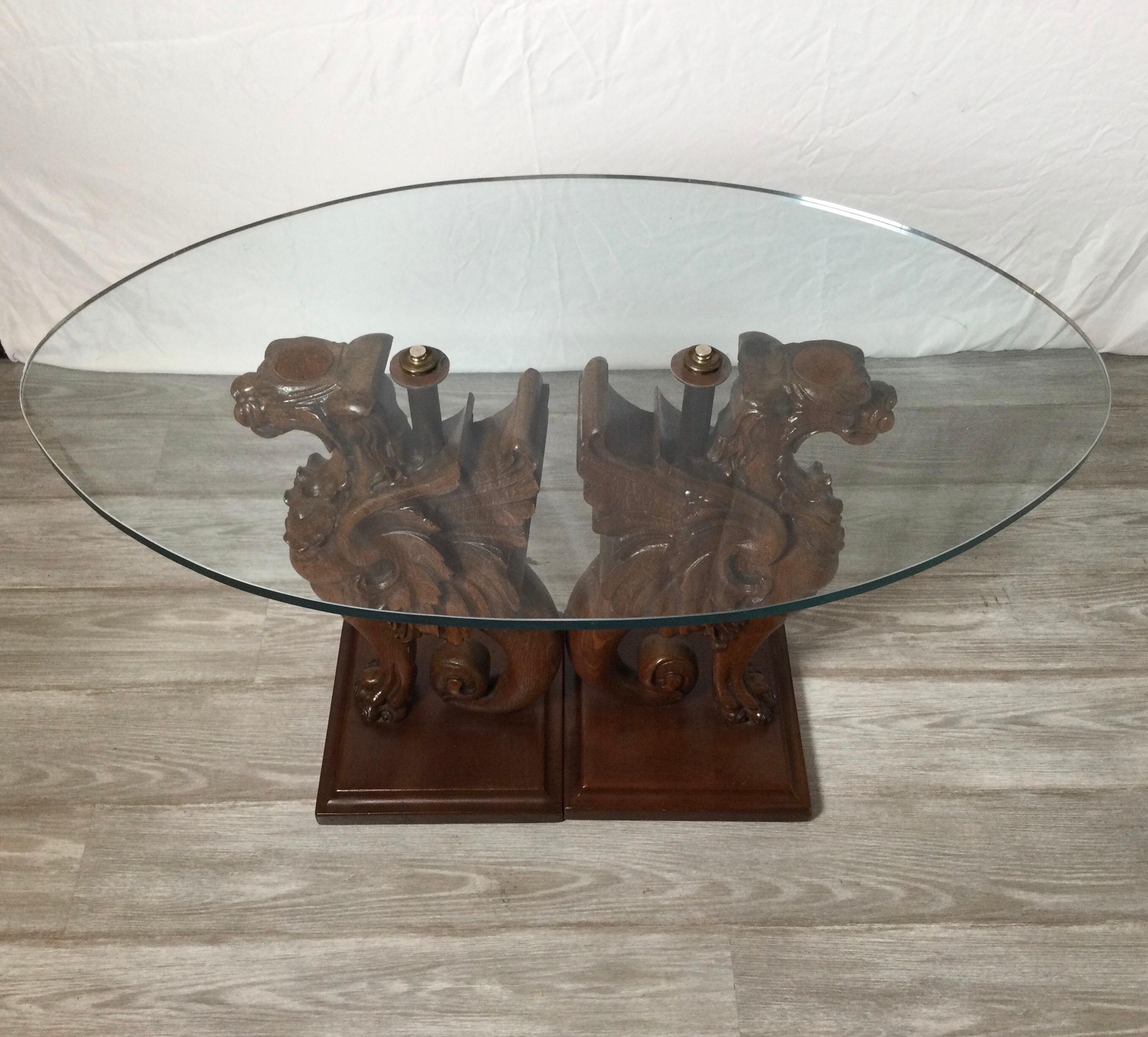 Circa 1900 hand carved oak griffin glass top low table, cocktail table
This unique size can be used as a cocktail table, side table or end table,
Dimensions: 35.50