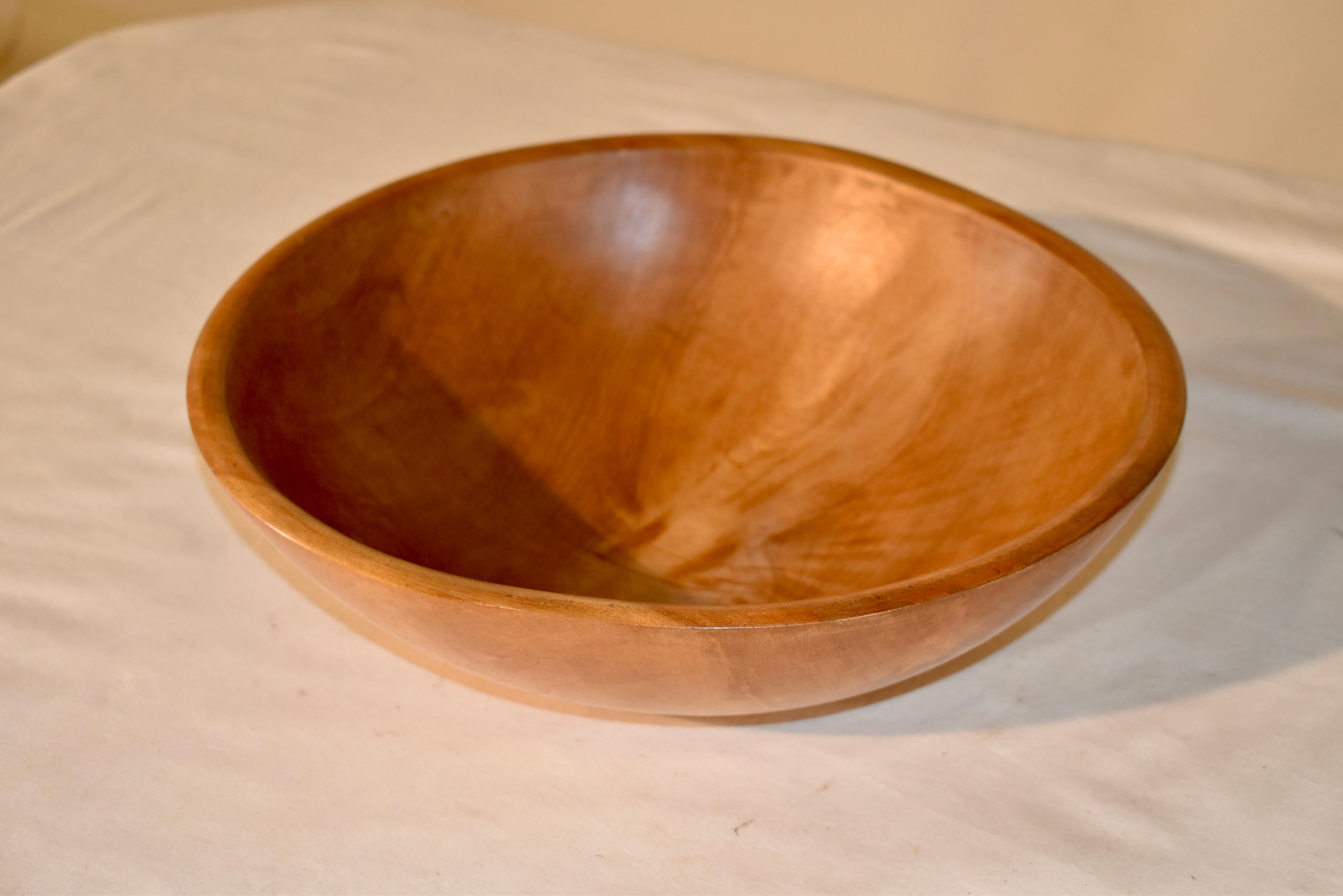 19th century hand turned maple bowl from England.  This book was expertly turned by a period craftsman and the quality shows in the craftsmanship.  The maple is wonderfully grained throughout the entire bowl, which makes this a very unique piece for