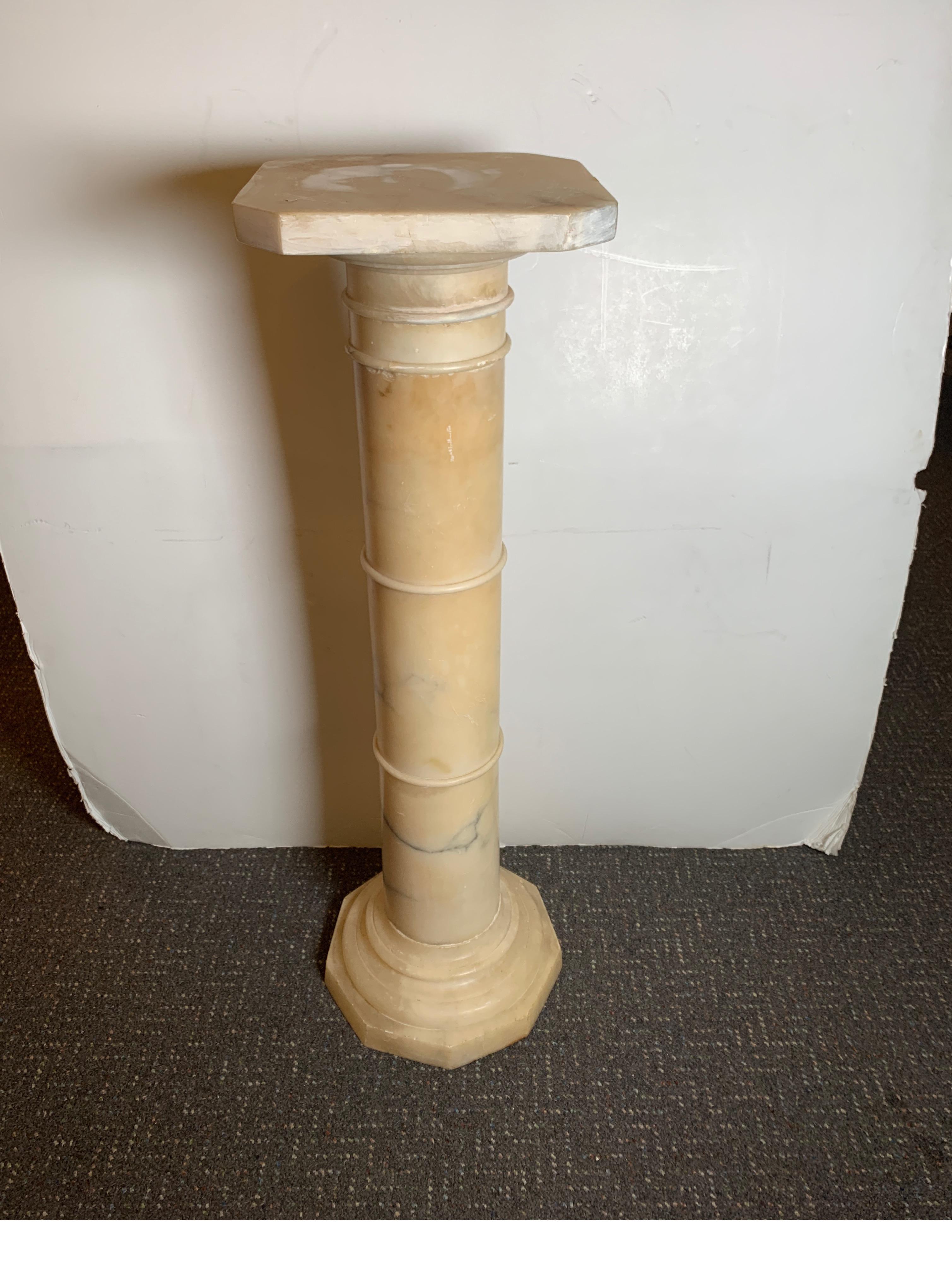 Italian Marble Pedestal, Traditional Minimal Design, circa 1900
Nice size and weight to accommodate heavy objects
Dimensions: 41