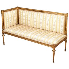 Vintage Louis XVI Style Gilded Sofa with Simple Skeleton Lines, circa 1900