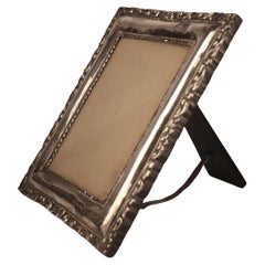 Circa 1900 Neoclassical Wooden Frame with Repoussé Sterling Silver Front Plate