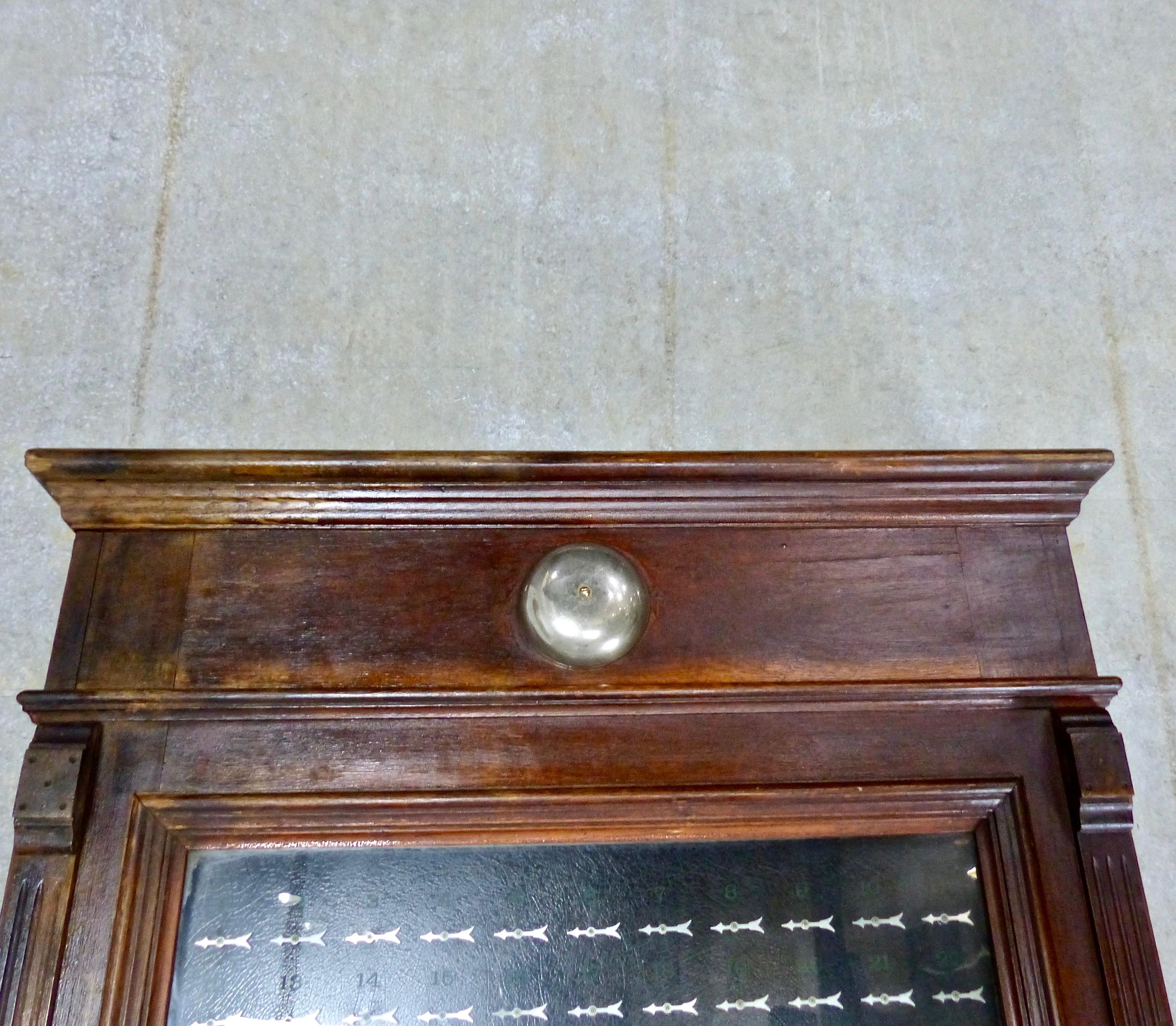 A circa 1900 hotel signal board/annunciator used to communicate between individual rooms and the lobby. Framed in solid oak, with mother of pearl knobs. A unique piece of wall art.
Dimensions: 55” H x 36” W x 8” D.